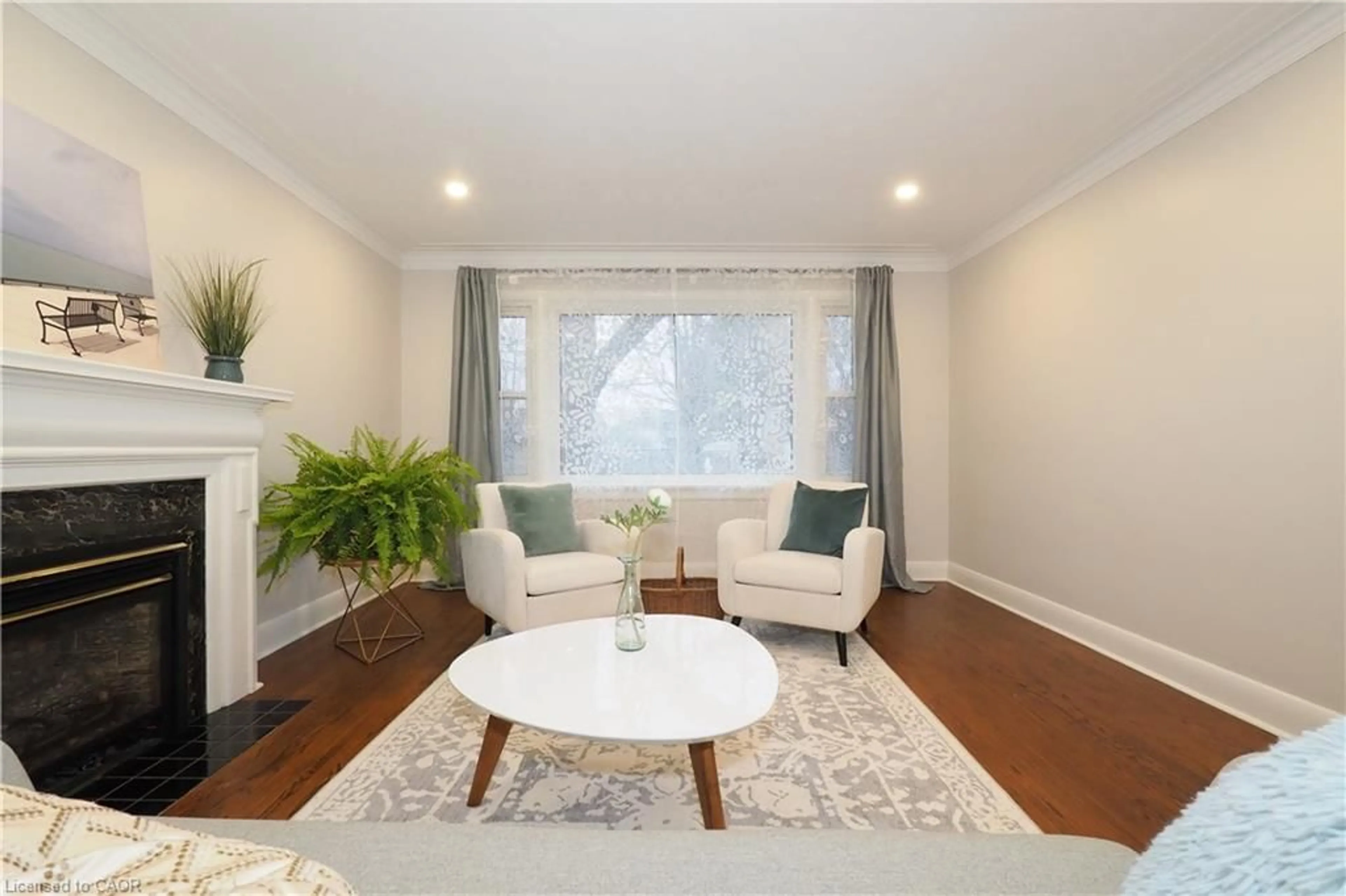 Living room with furniture, wood/laminate floor for 296 Dumfries Ave, Kitchener Ontario N2H 2E8