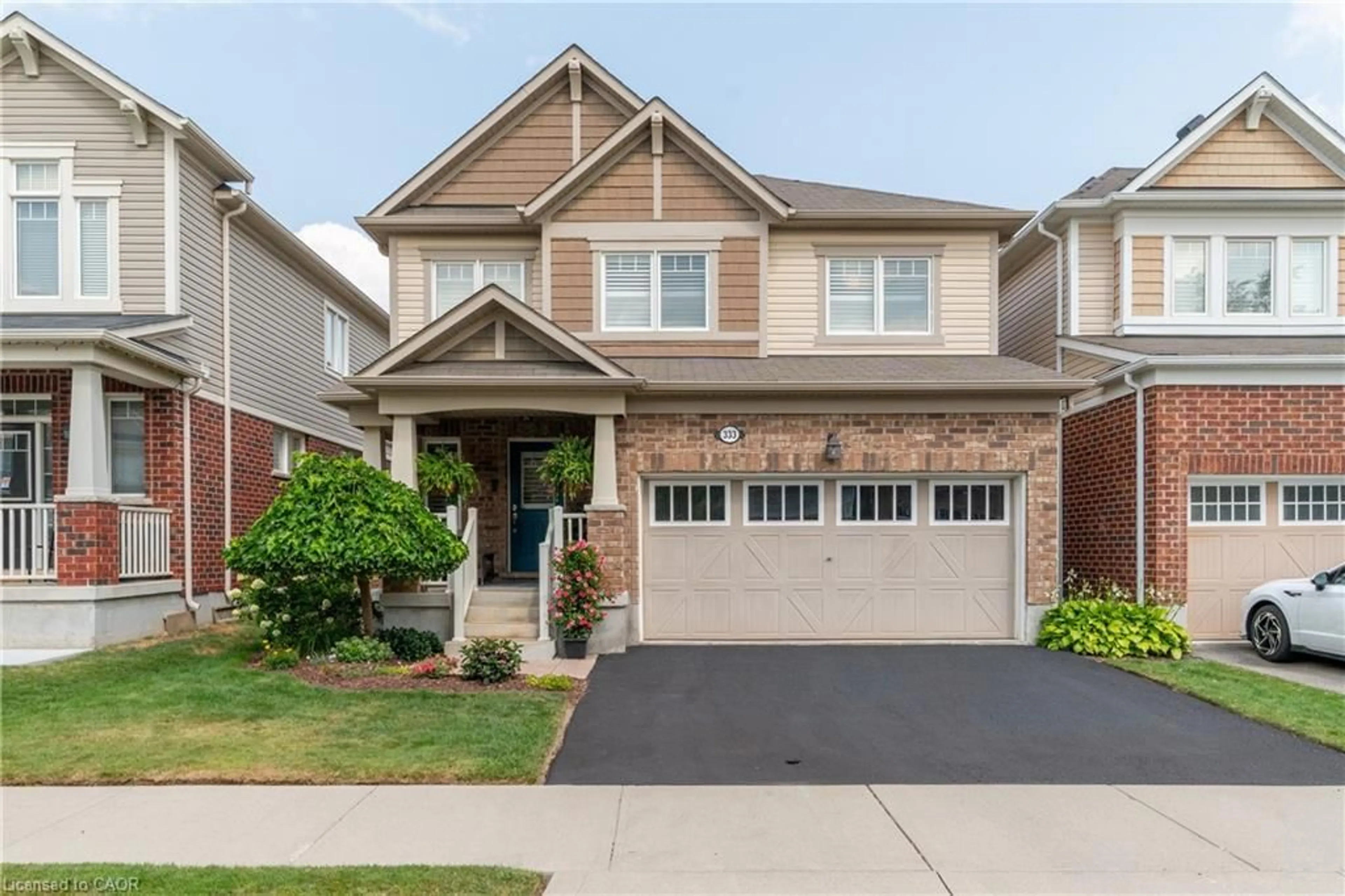 Home with brick exterior material, street for 333 Apple Hill Cres, Kitchener Ontario N2R 0E5