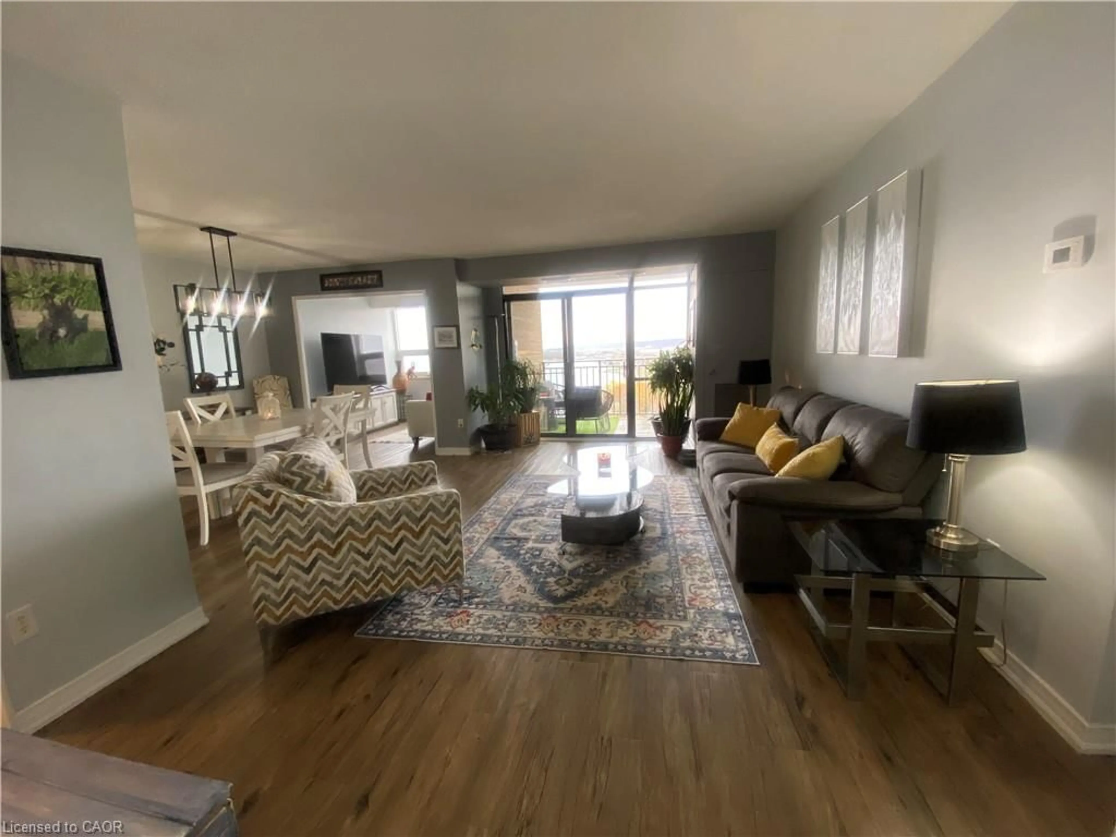 Living room with furniture, unknown for 500 Green Rd #1607, Stoney Creek Ontario L8E 3M6