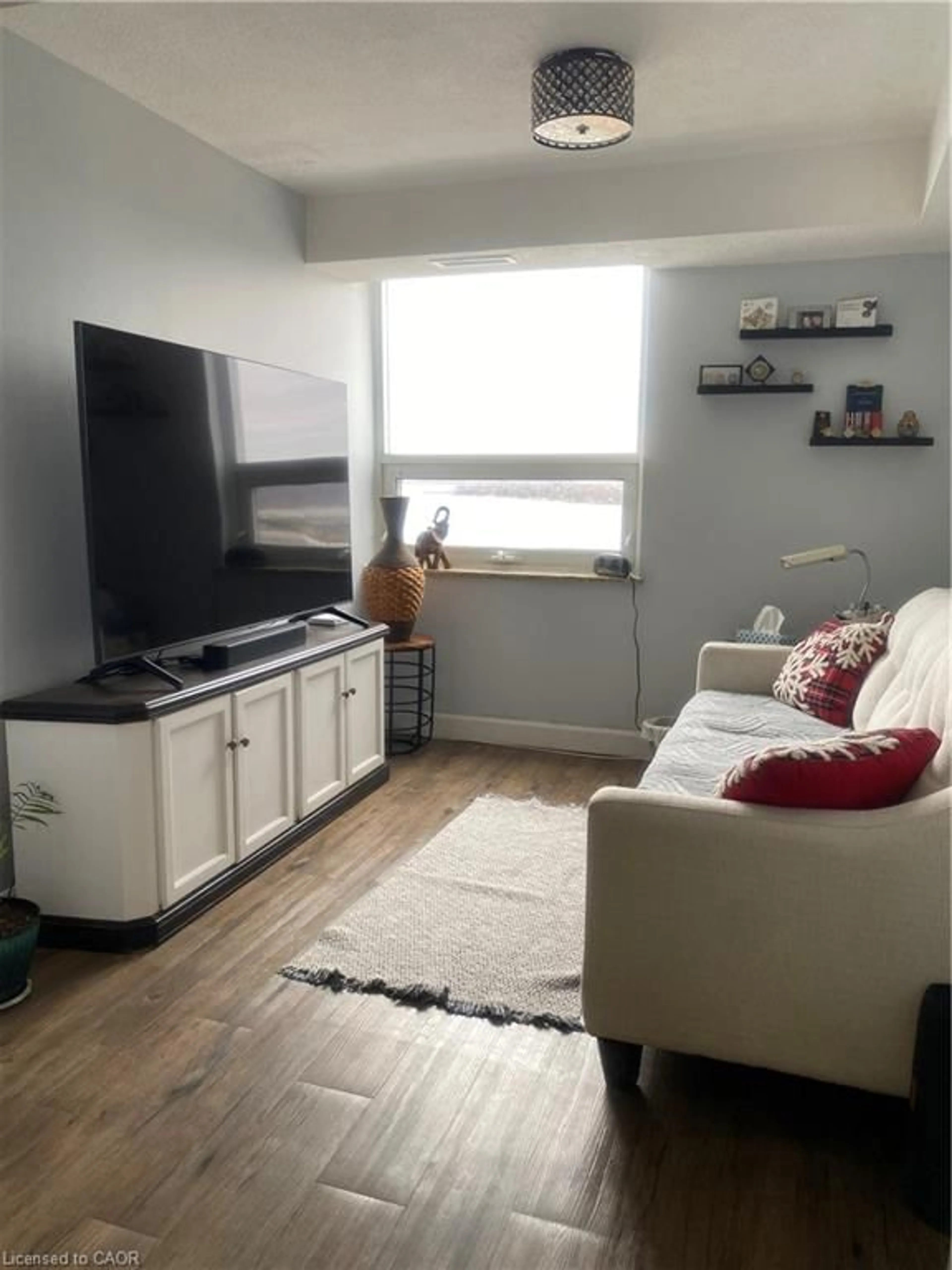 Living room with furniture, unknown for 500 Green Rd #1607, Stoney Creek Ontario L8E 3M6