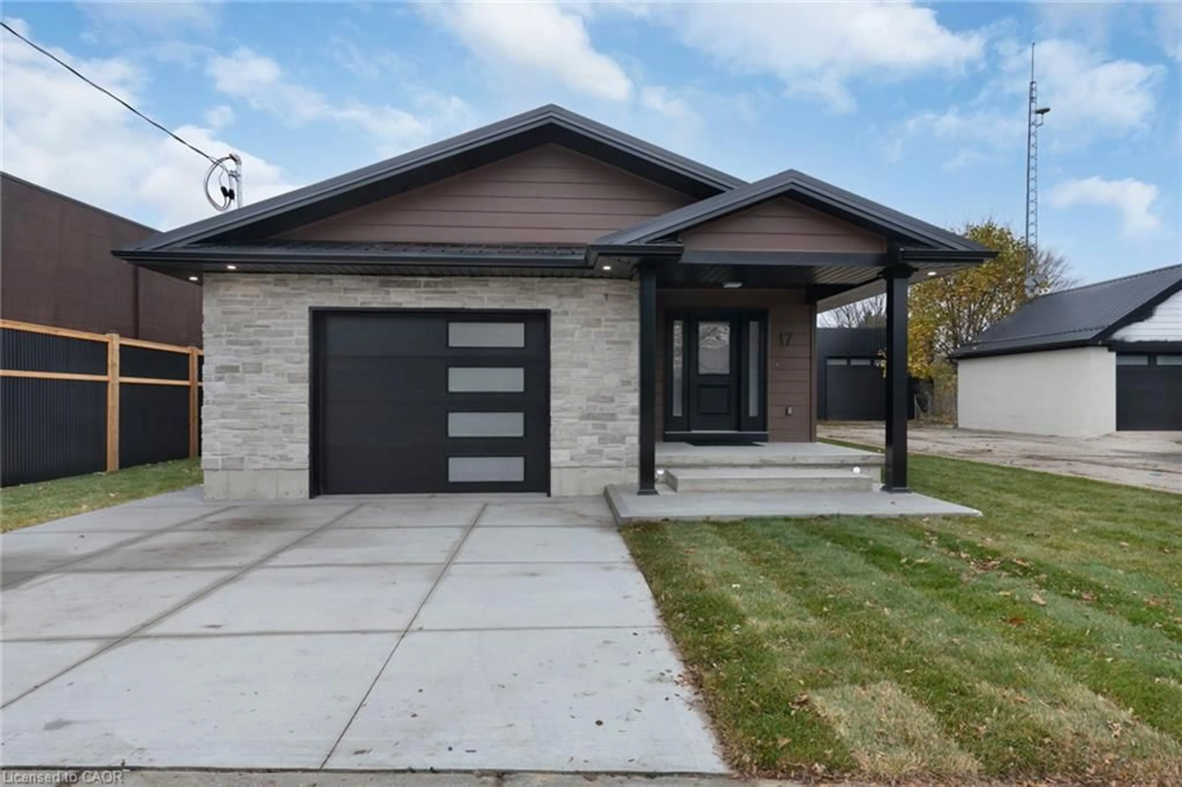 Home with brick exterior material, street for 17 Church St, Delhi Ontario N4B 1T3