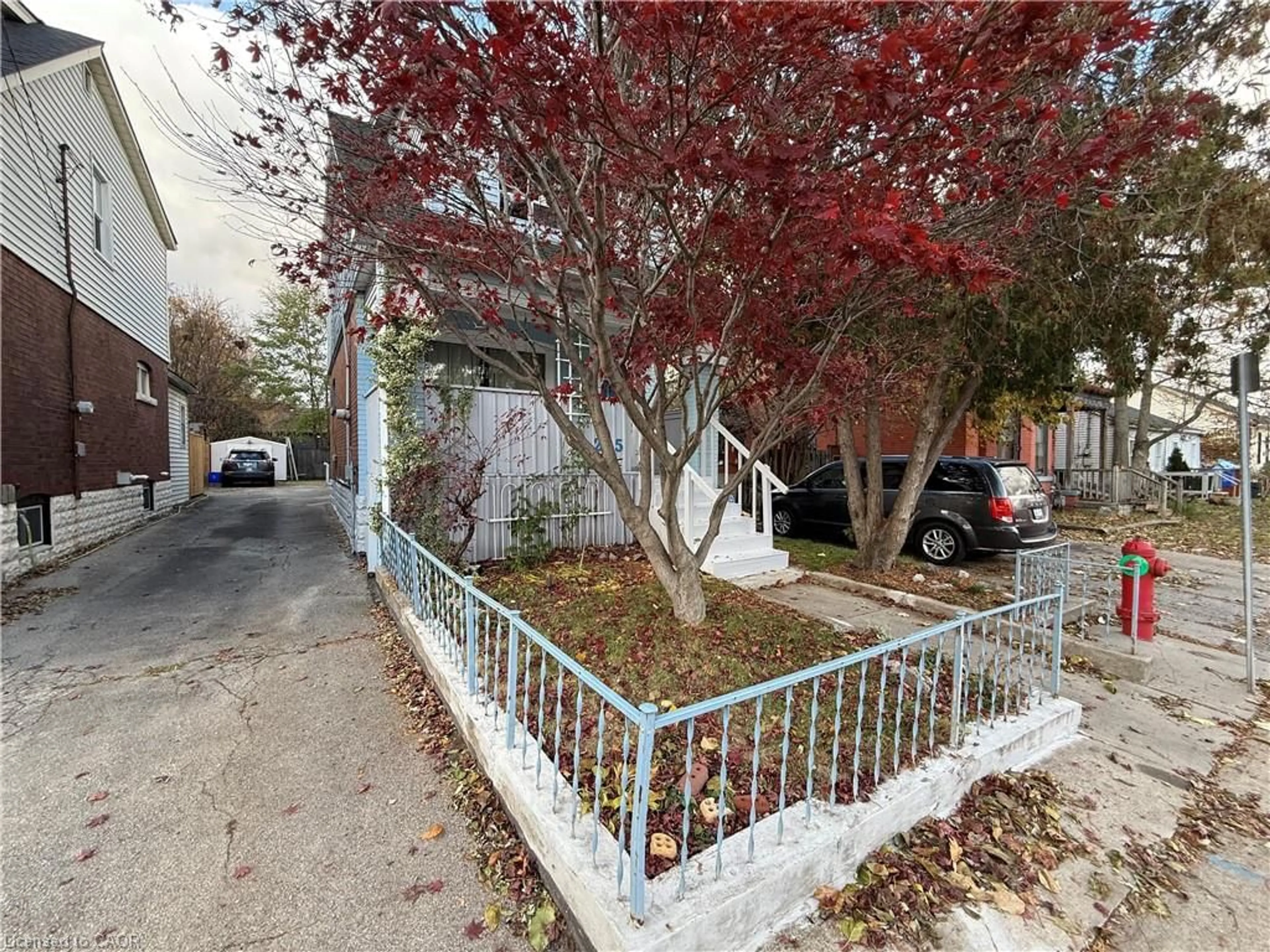 A pic from outside/outdoor area/front of a property/back of a property/a pic from drone, street for 205 Locke St, Hamilton Ontario L8R 3B1