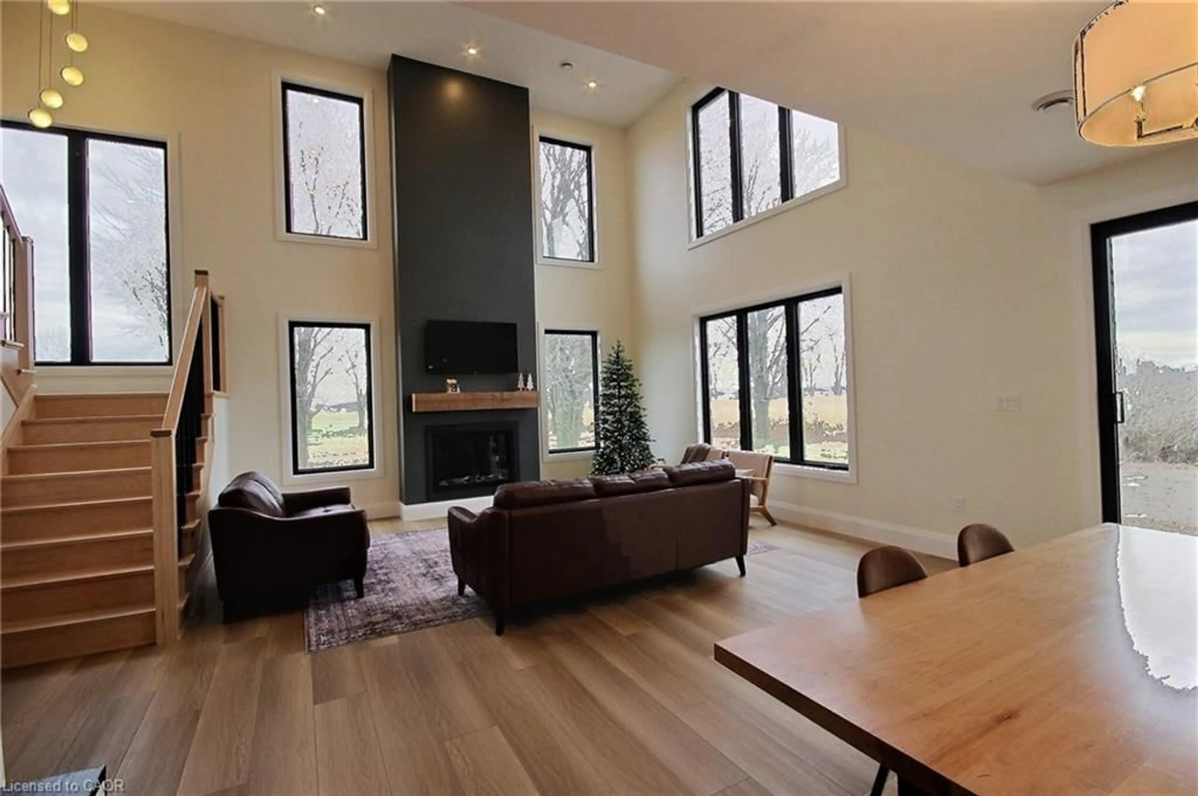 Living room with furniture, wood/laminate floor for 6589 164 Rd, Monkton Ontario N0K 1P0