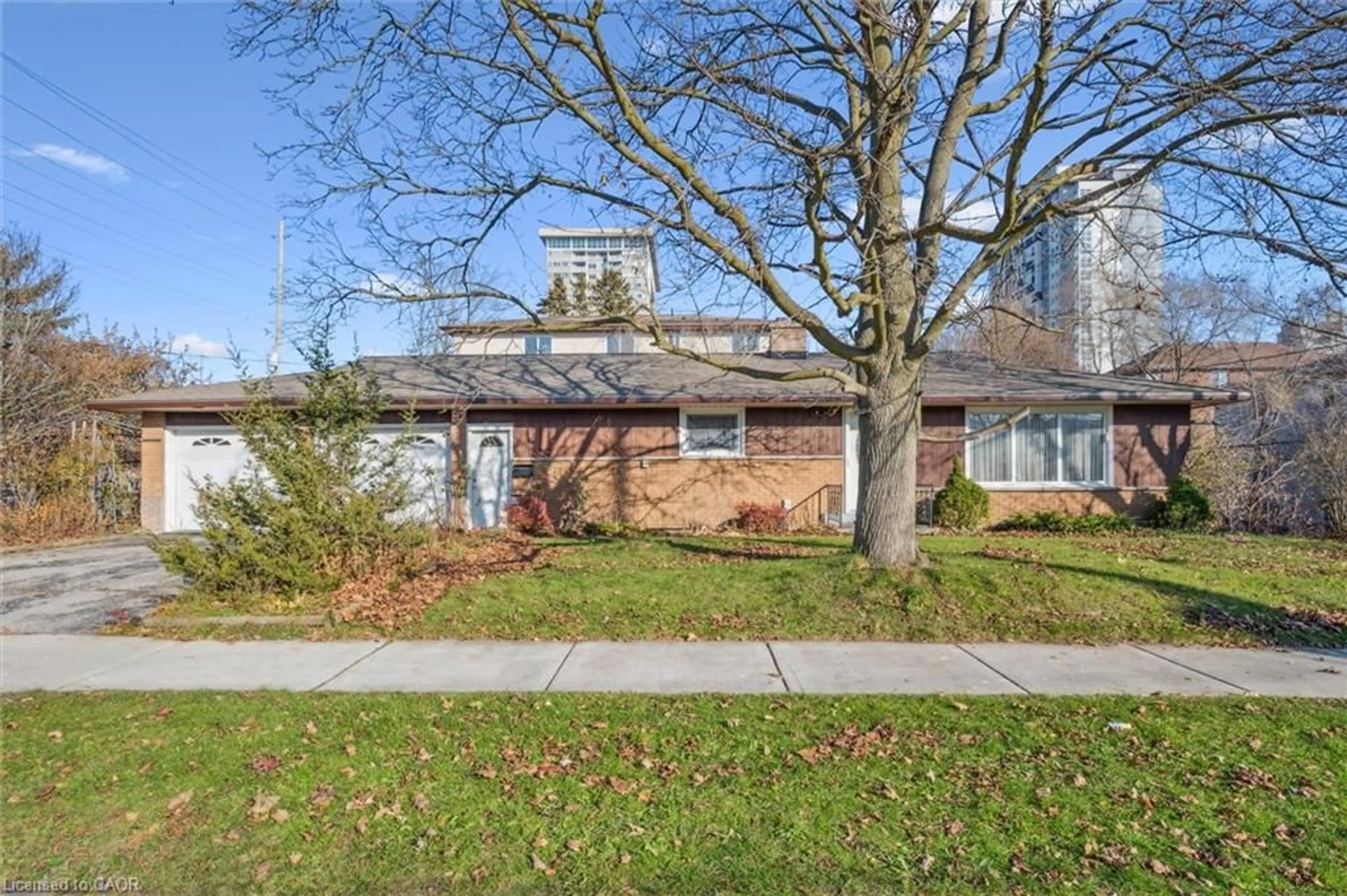 Home with brick exterior material, street for 366 Holly St, Waterloo Ontario N2L 4G3