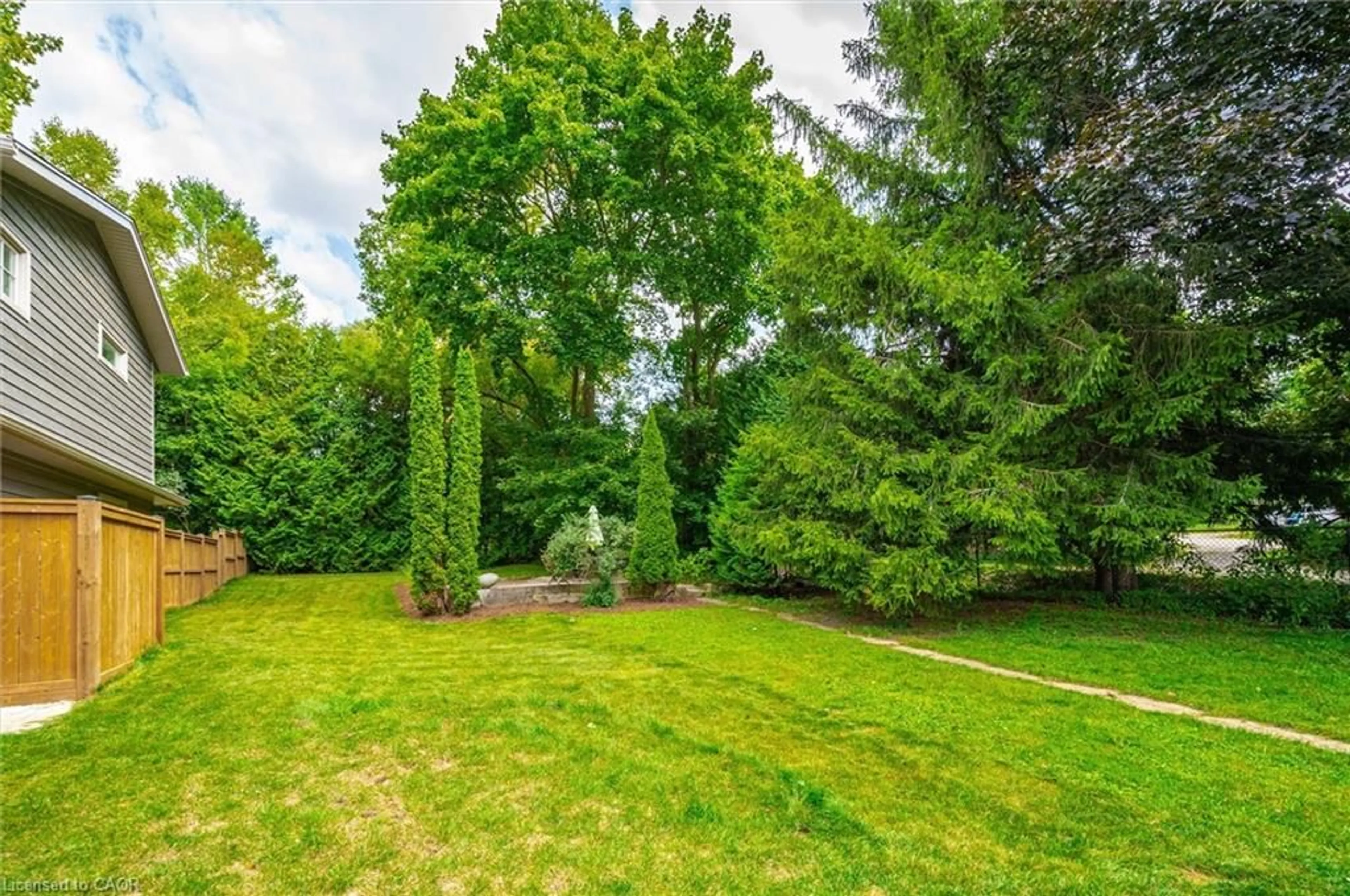 A pic from outside/outdoor area/front of a property/back of a property/a pic from drone, forest/trees view for 377 Geddes St, Elora Ontario N0B 1S0