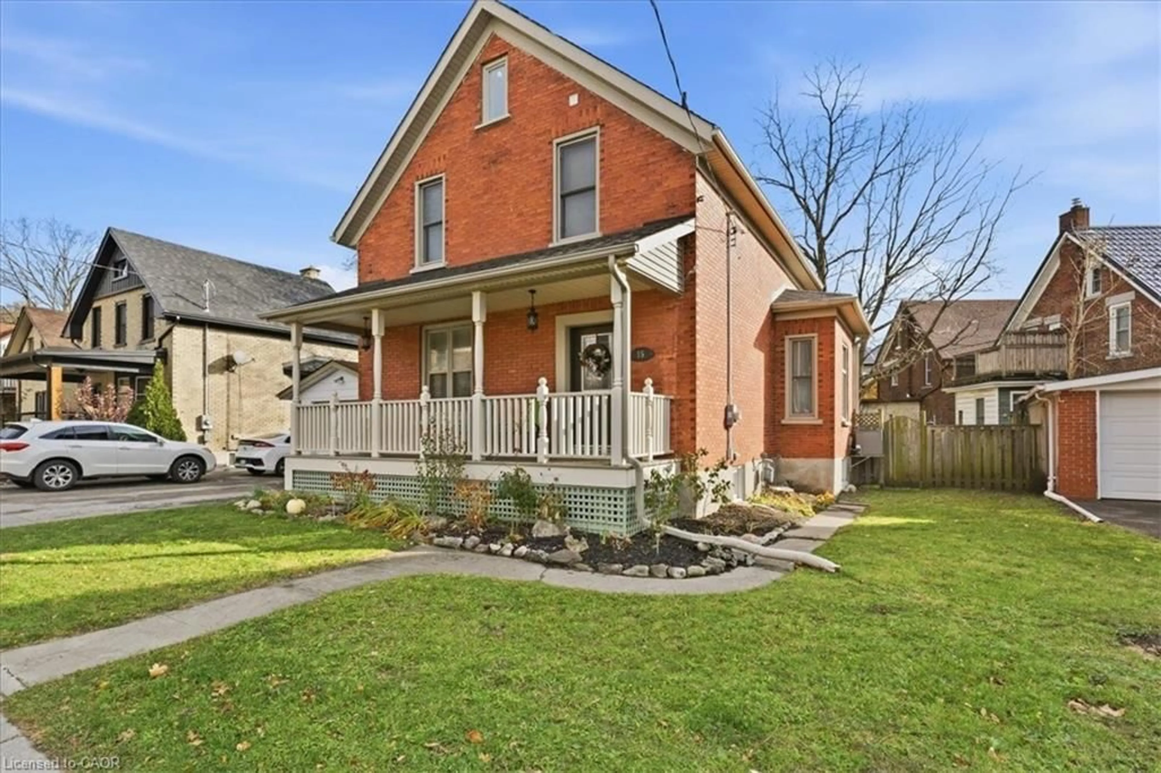 Home with brick exterior material, street for 15 Glasgow St, Kitchener Ontario N2G 2G5