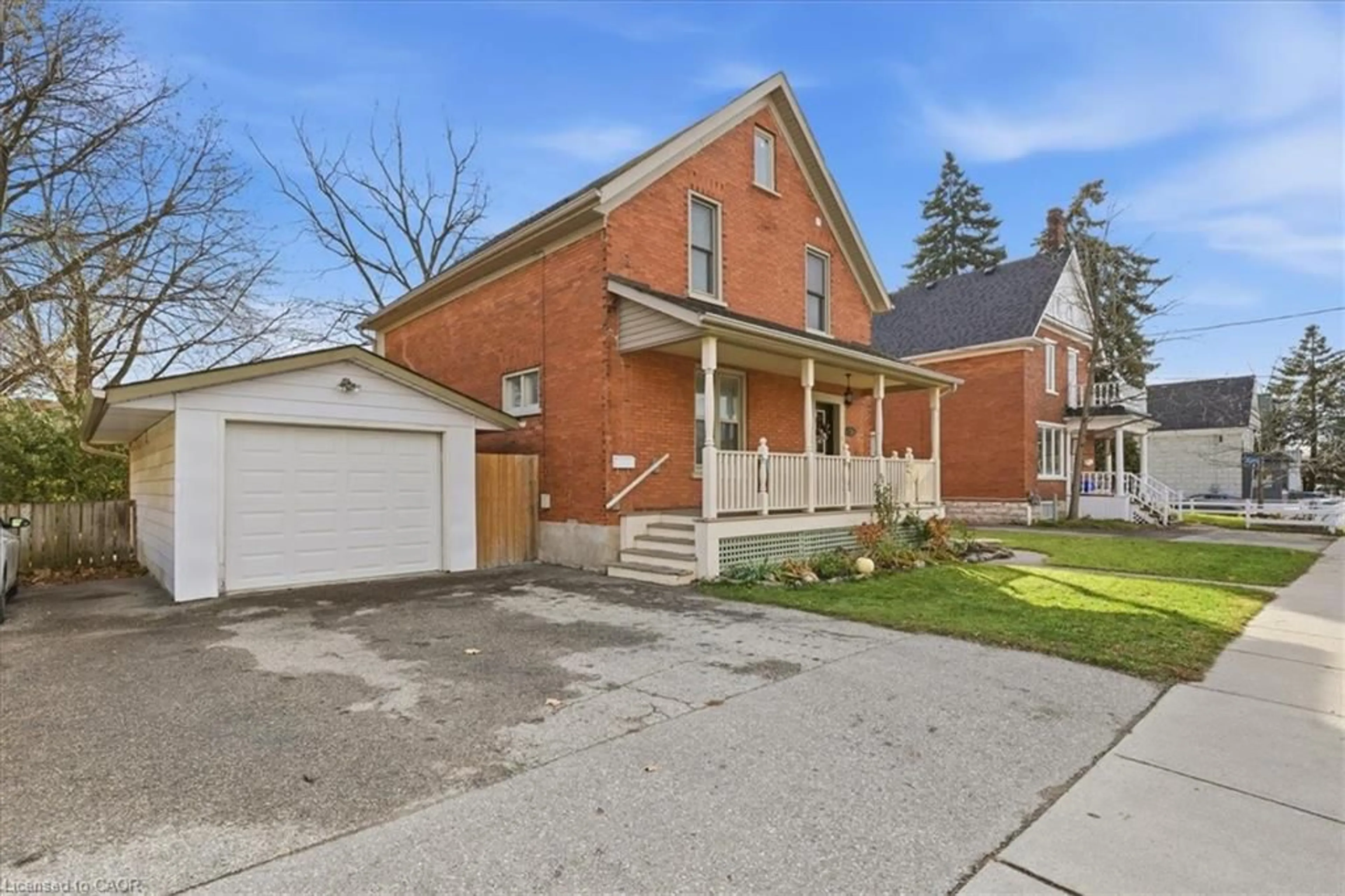 Home with brick exterior material, street for 15 Glasgow St, Kitchener Ontario N2G 2G5