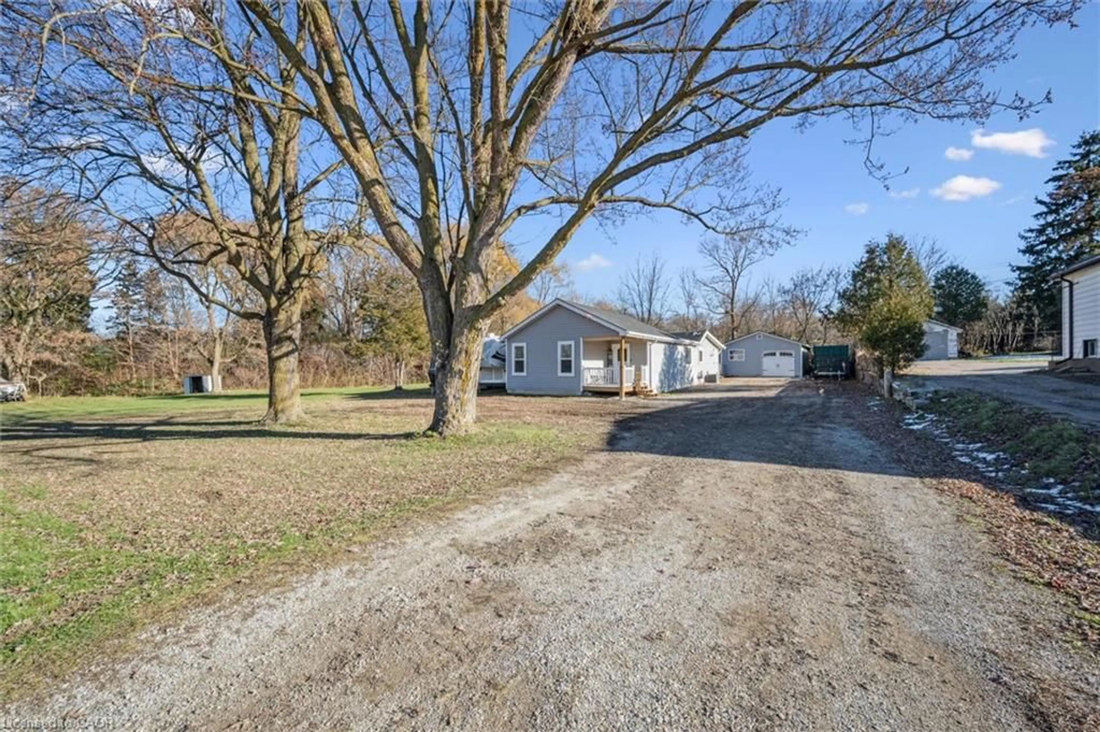 A pic from outside/outdoor area/front of a property/back of a property/a pic from drone, street for 584038 Beachville Rd, Ingersoll Ontario N5C 3J5