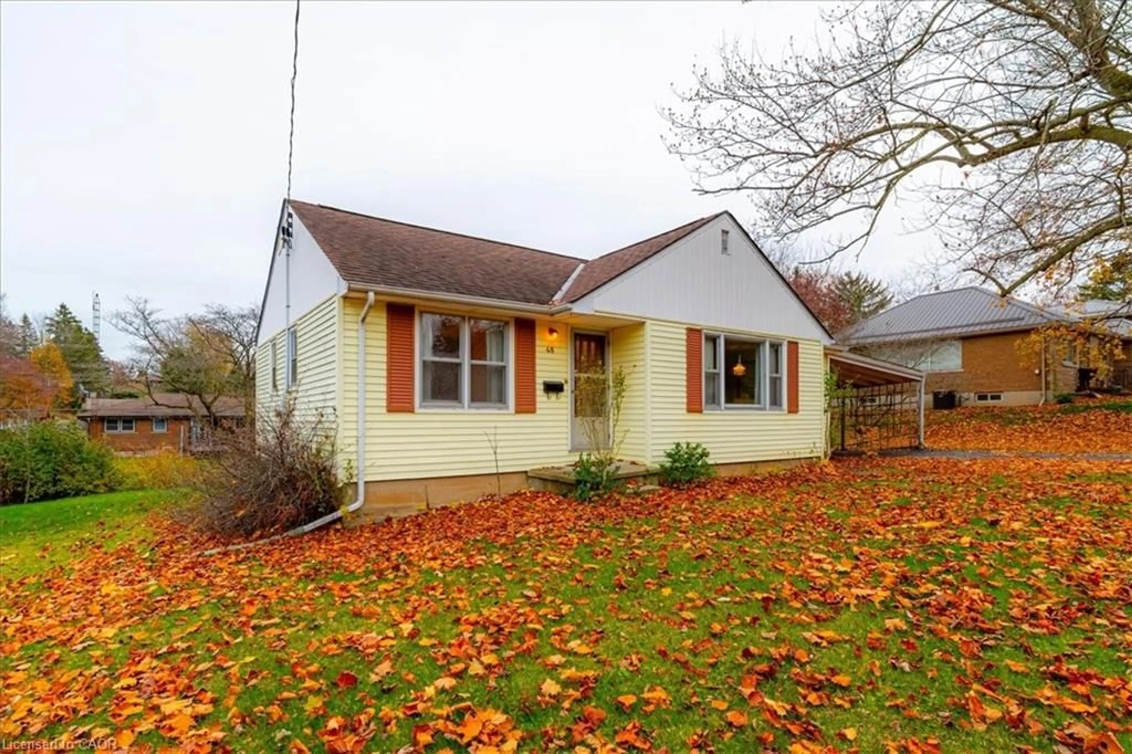 Home with vinyl exterior material, street for 48 Cherry St, Simcoe Ontario N3Y 1B4