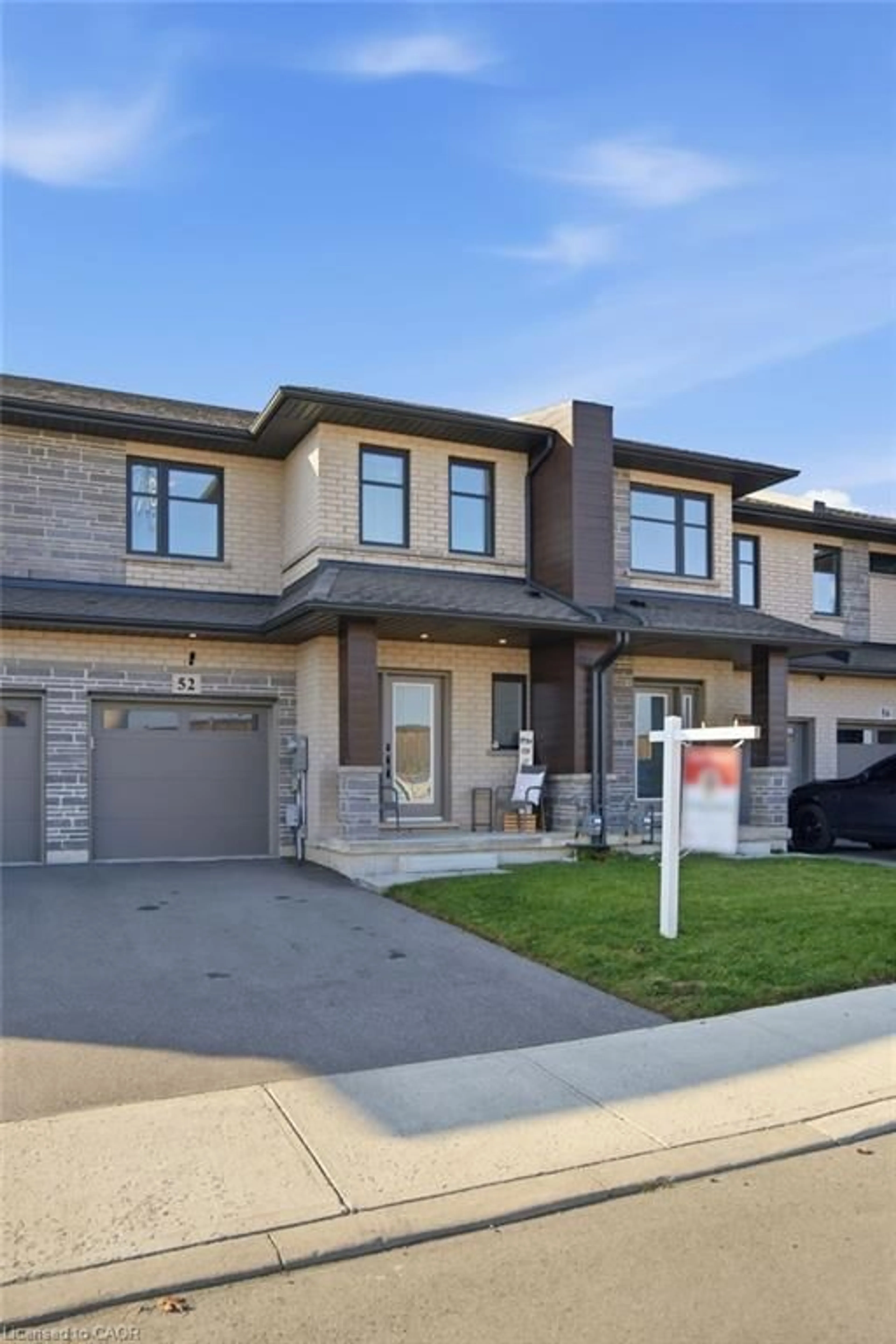 Home with brick exterior material, street for 52 Jayla Lane, Smithville Ontario L0R 2A0