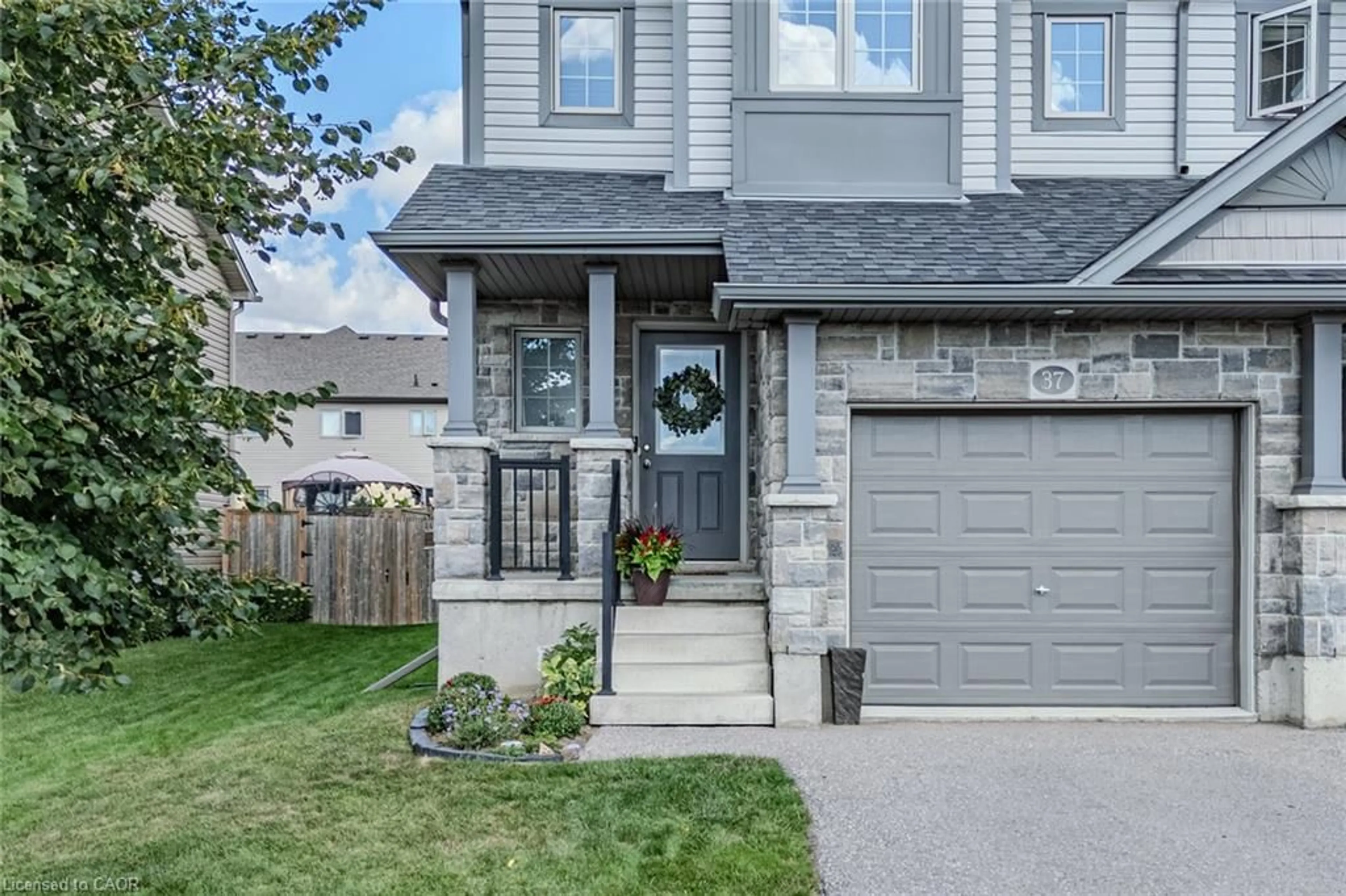 Home with brick exterior material, street for 37 Trillium Way, Simcoe Ontario N3Y 0B9