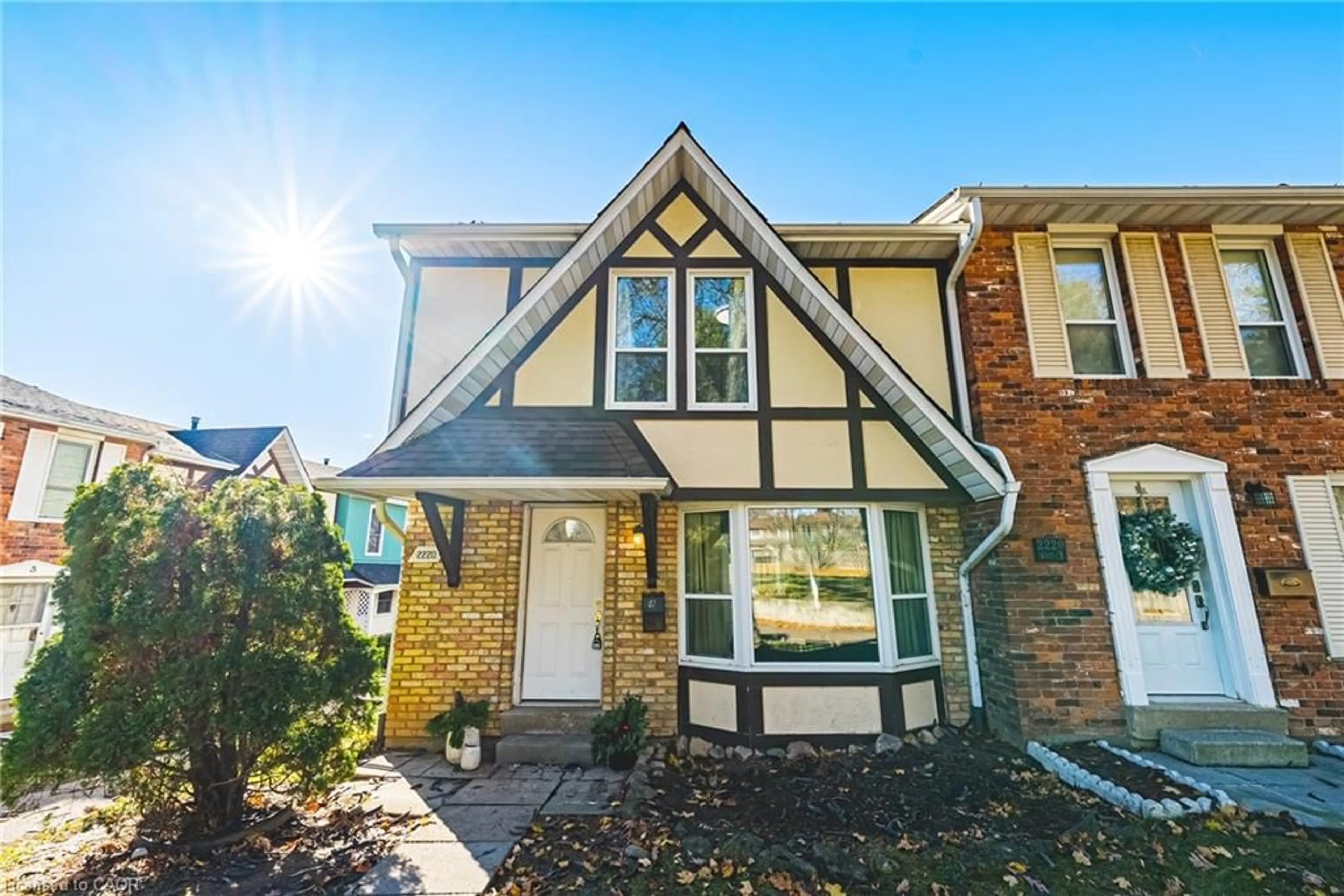 Home with brick exterior material, street for 2220 Upper Middle Rd #4, Burlington Ontario L7P 2Z9