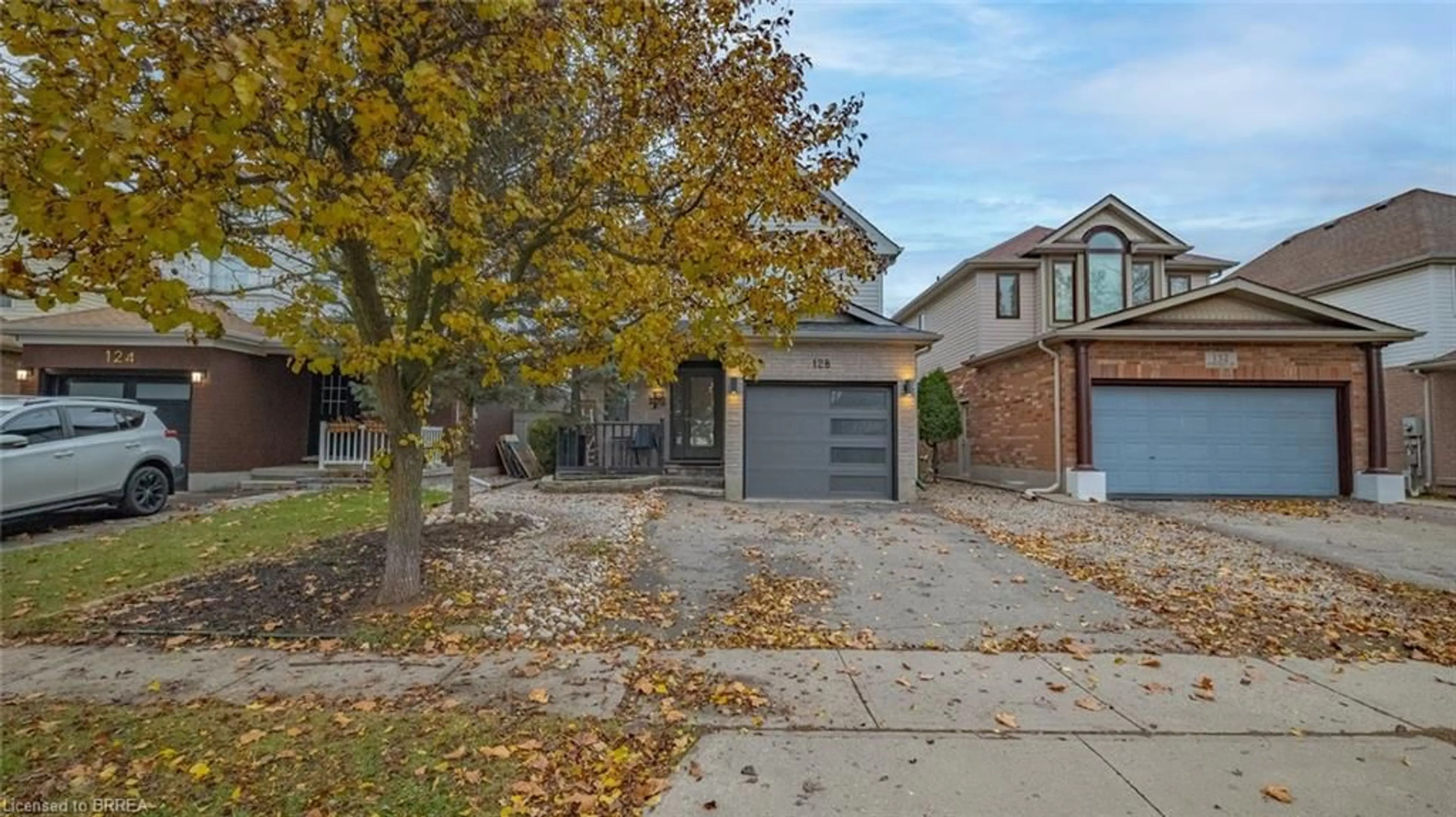 Home with brick exterior material, street for 128 Mcmeeken Dr, Cambridge Ontario N3C 4E7