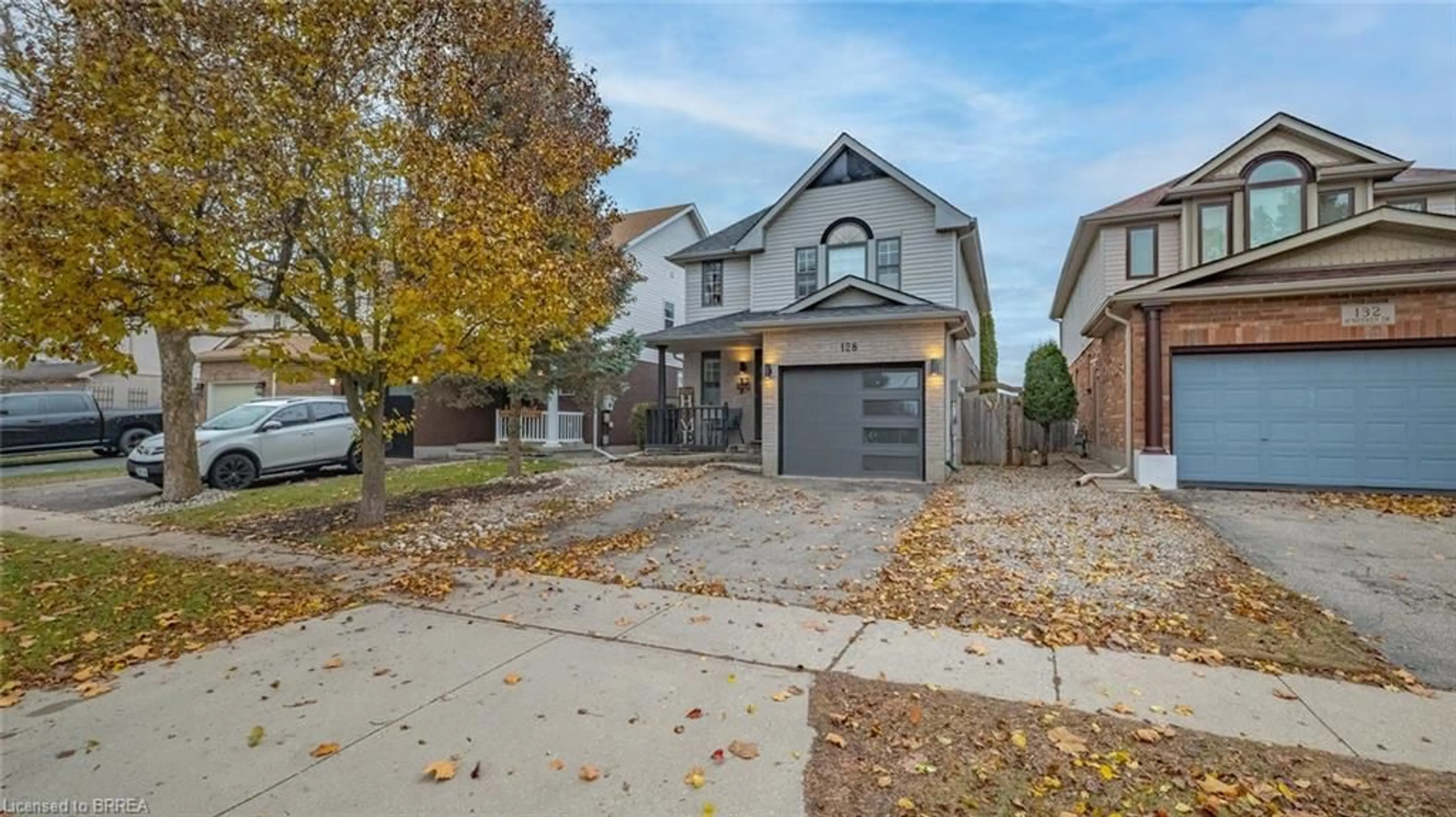 Home with brick exterior material, street for 128 Mcmeeken Dr, Cambridge Ontario N3C 4E7