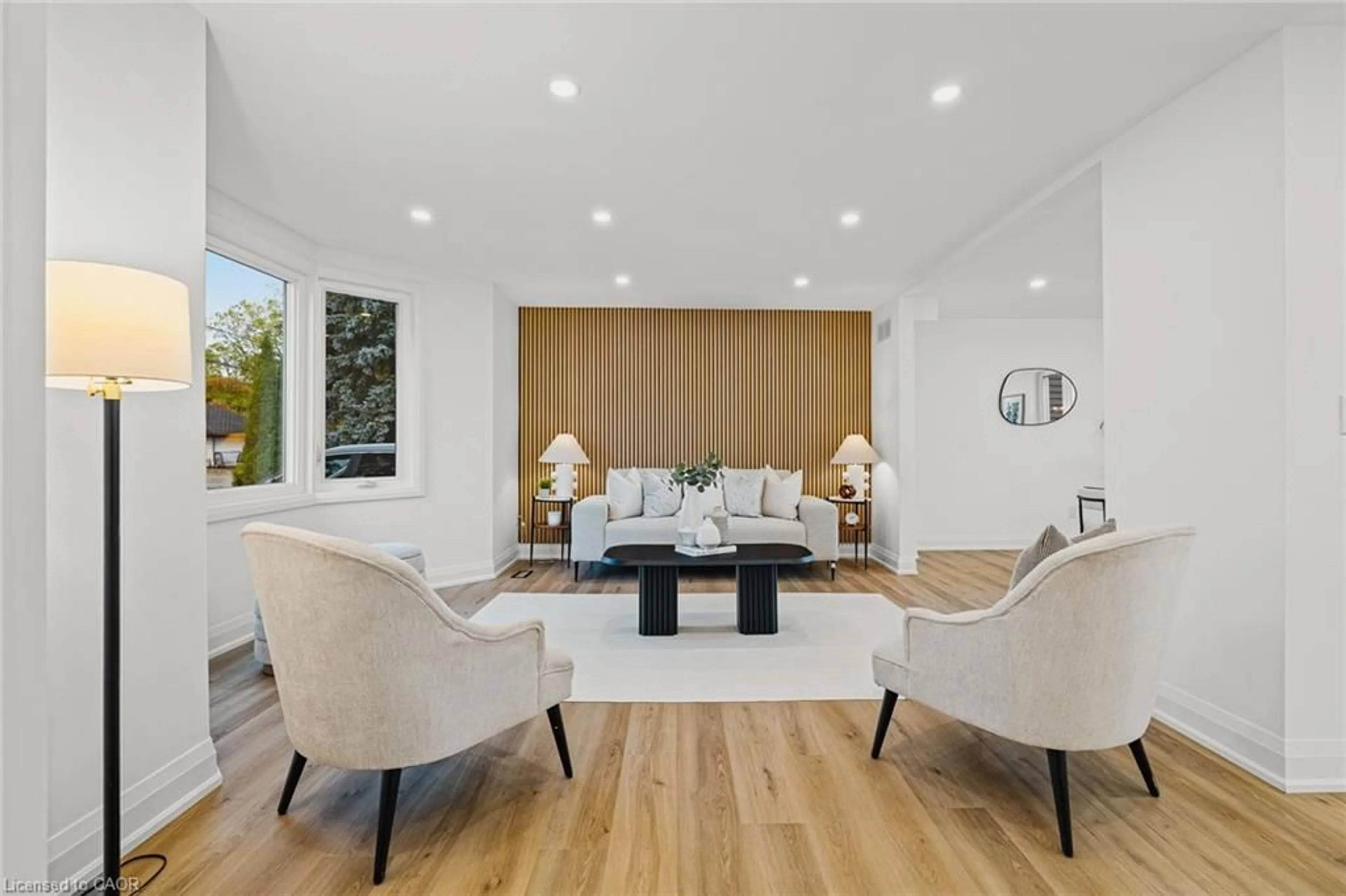 Living room with furniture, wood/laminate floor for 12 Scheifele Pl, Woolwich Ontario N0B 1M0