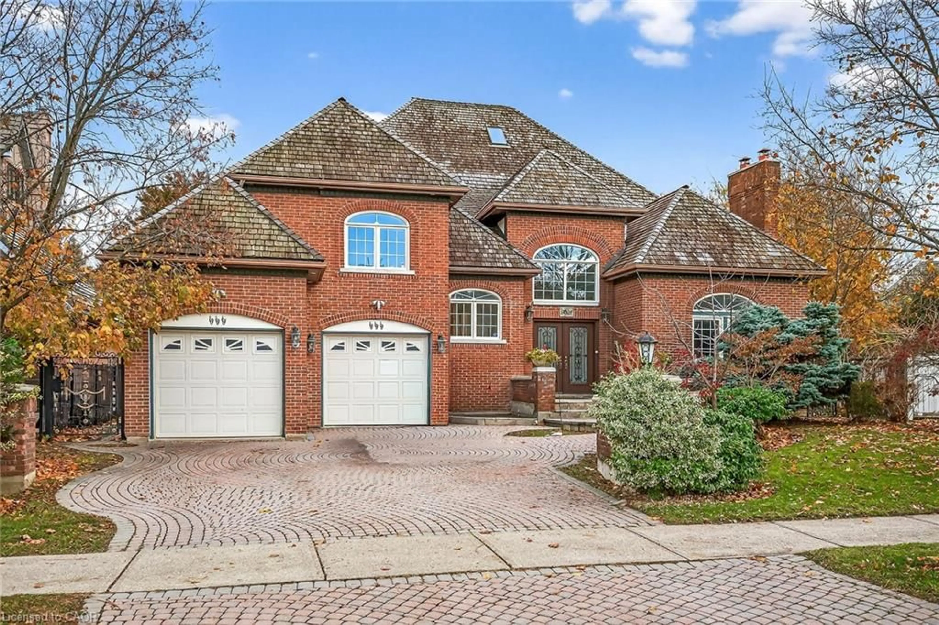 Home with brick exterior material, street for 5089 Forest Hill Dr, Mississauga Ontario L5M 5A2