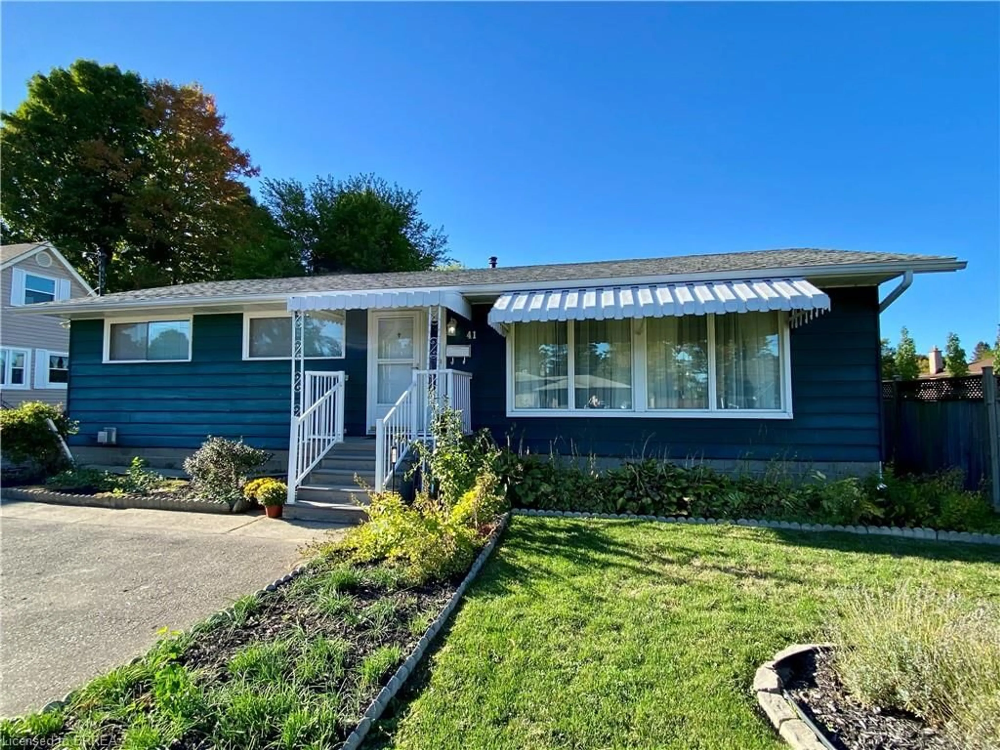 Home with vinyl exterior material, street for 41 Dunsdon St, Brantford Ontario N3R 3J2