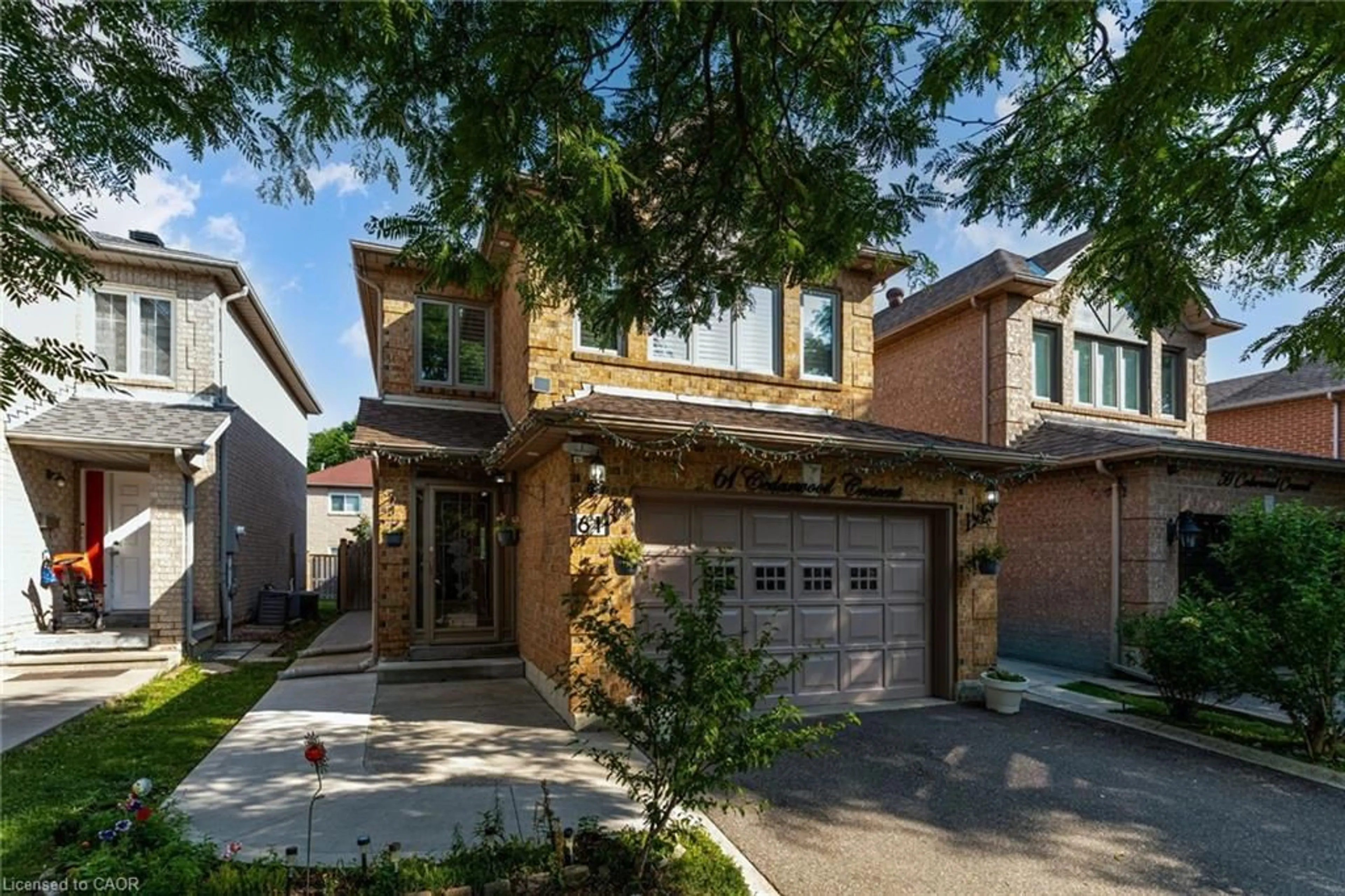 Home with brick exterior material, street for 61 Cedarwood Cres, Brampton Ontario L6X 4J9