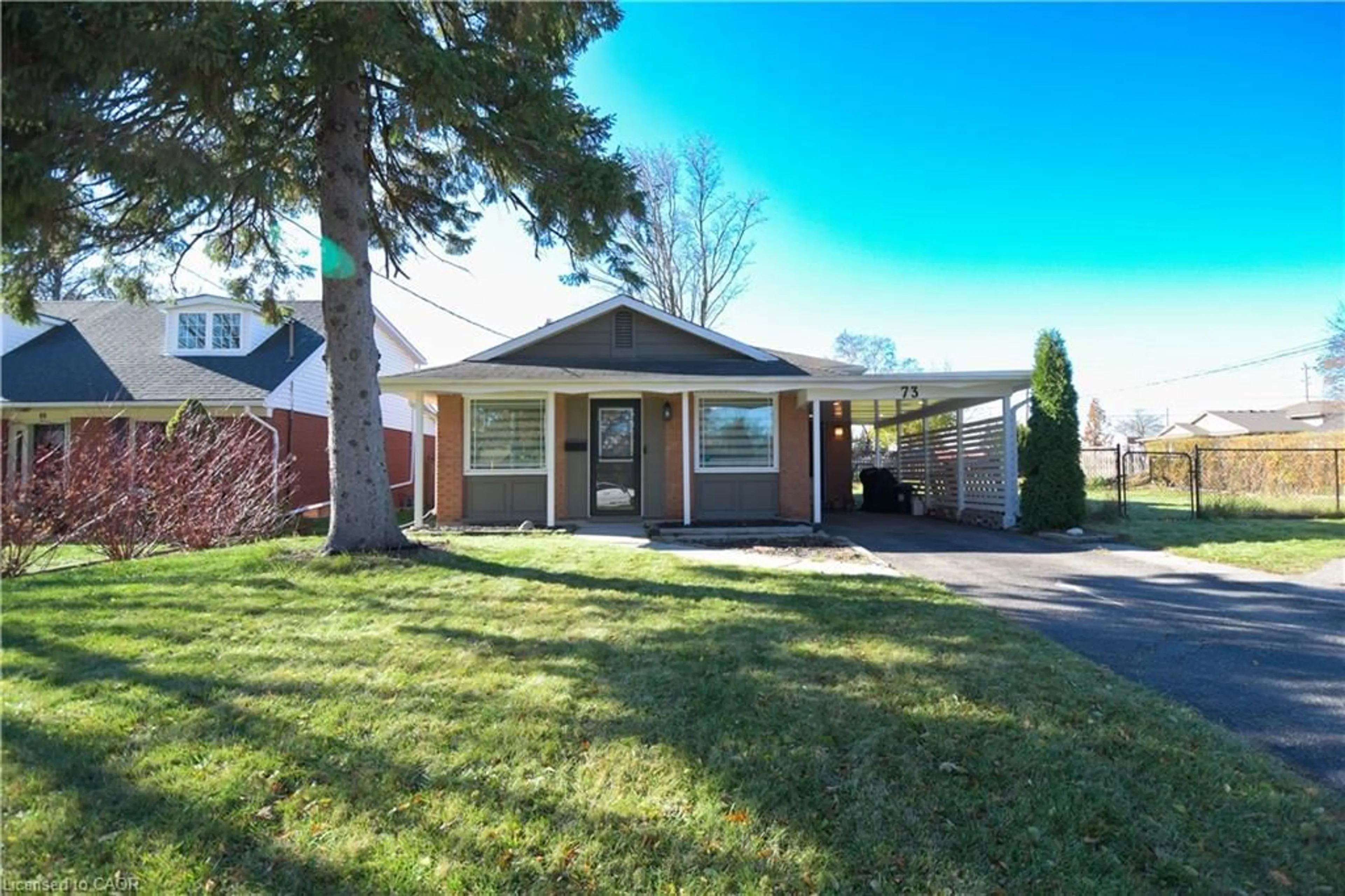 Home with brick exterior material, street for 73 Larkspur Cres, Kitchener Ontario N2M 4W8