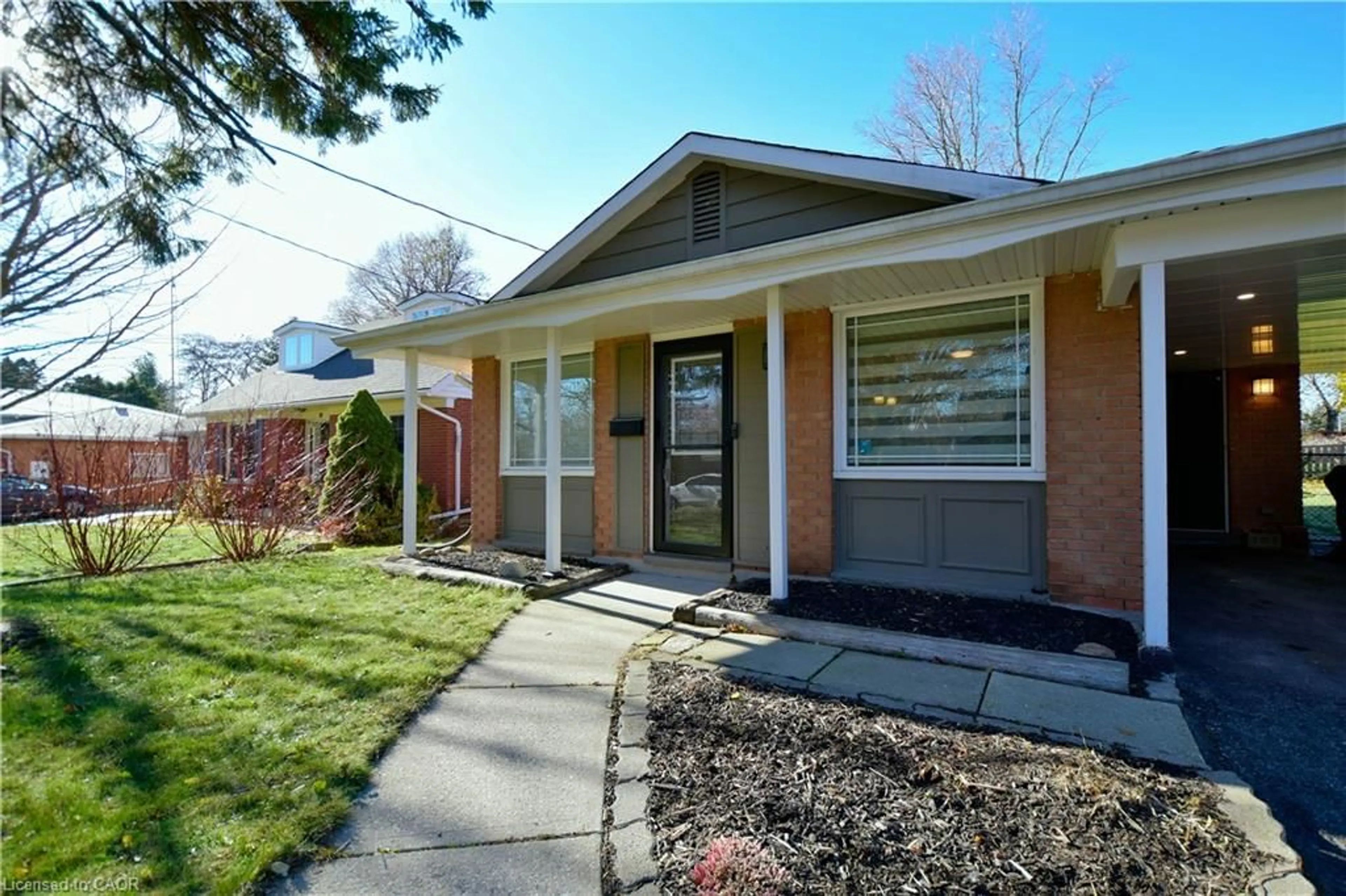 Home with brick exterior material, street for 73 Larkspur Cres, Kitchener Ontario N2M 4W8