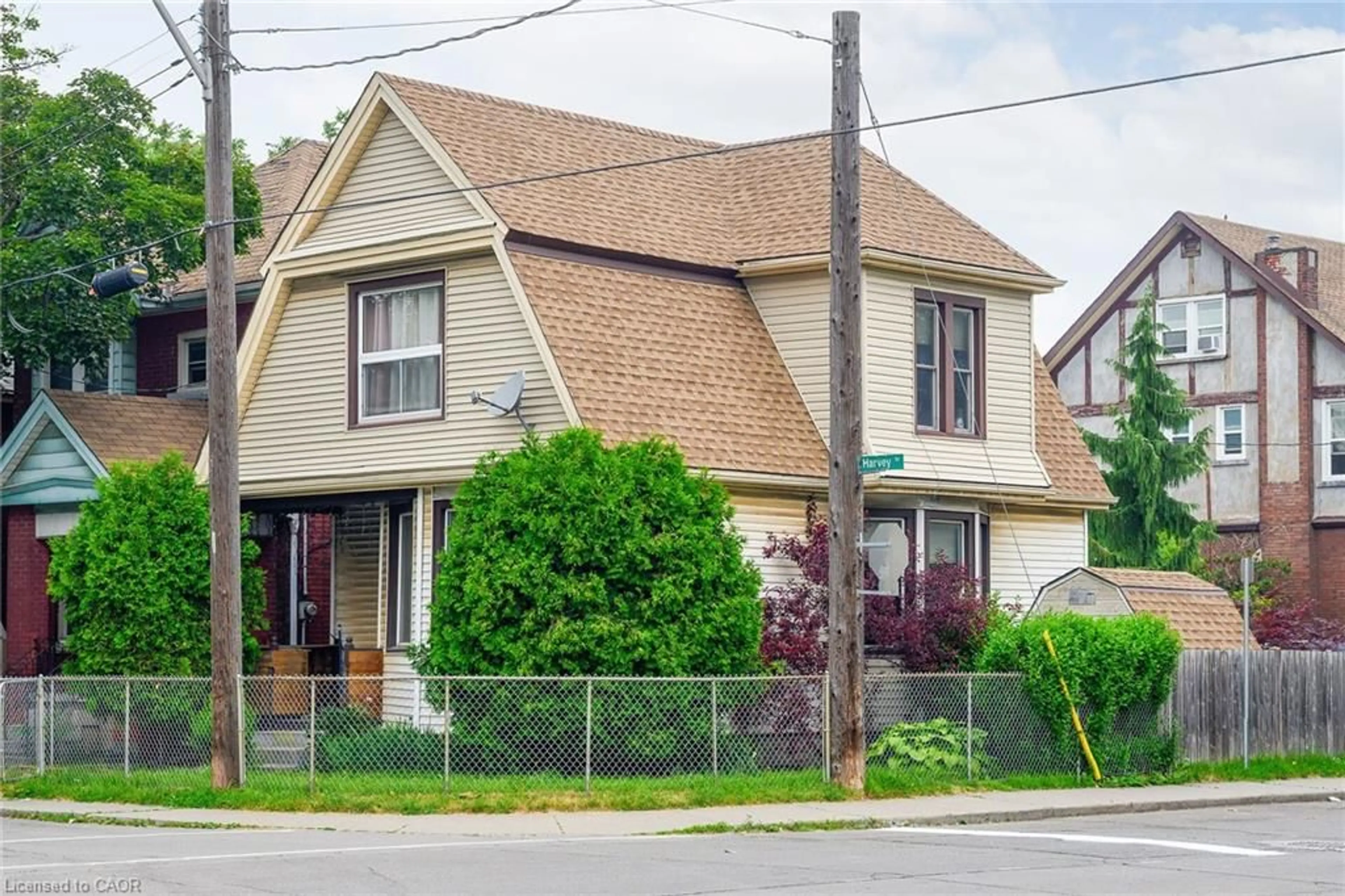 Home with vinyl exterior material, street for 55 Harvey St, Hamilton Ontario L8L 2L9