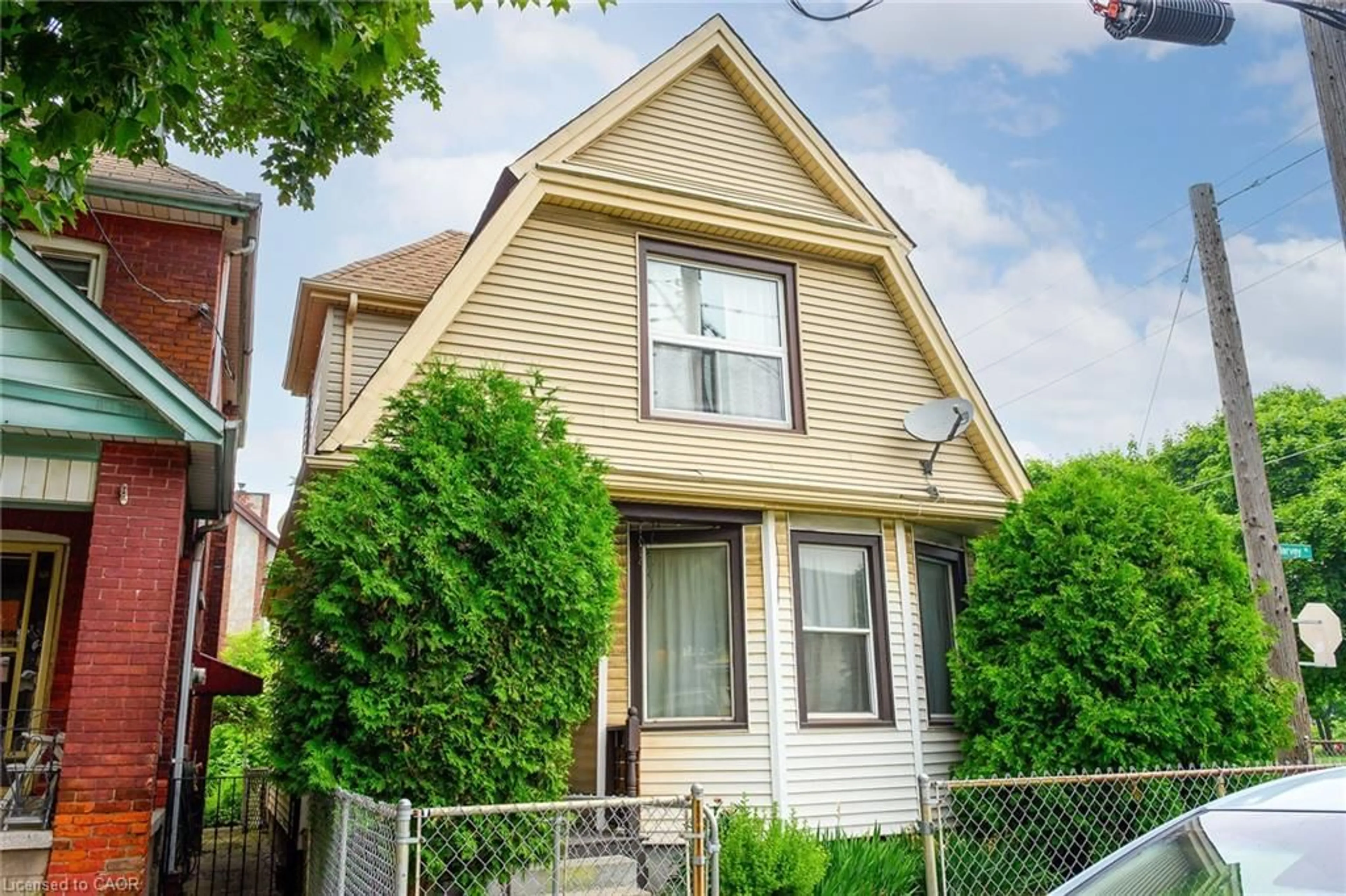 Home with vinyl exterior material, street for 55 Harvey St, Hamilton Ontario L8L 2L9