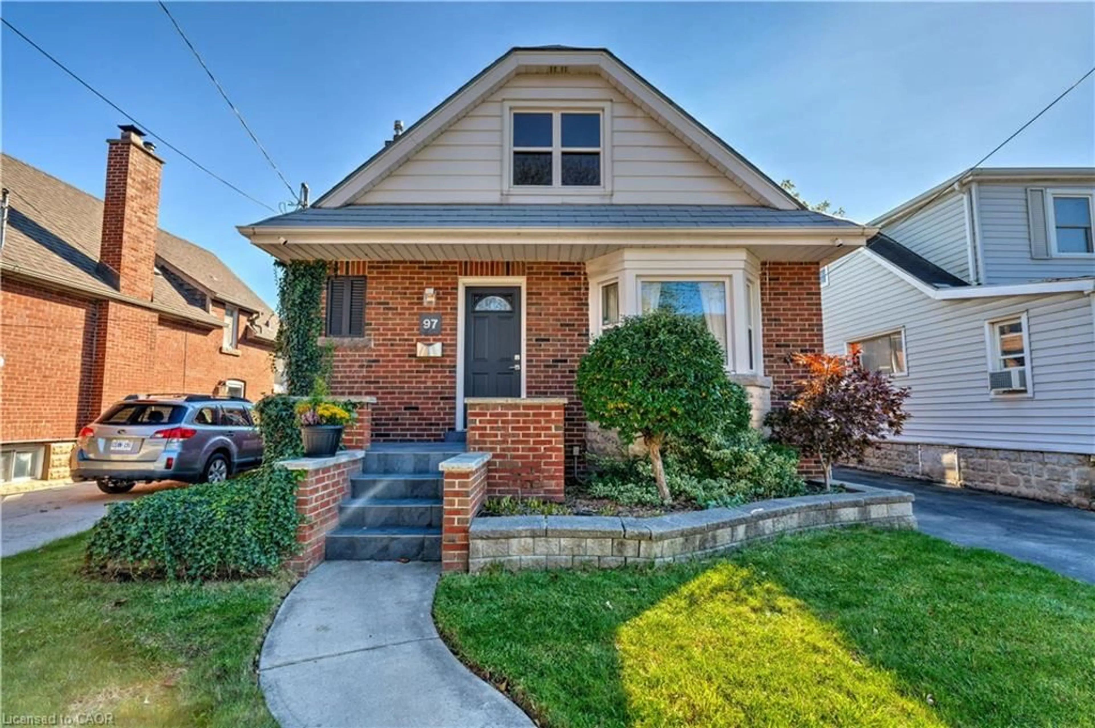 Home with brick exterior material, street for 97 Knyvet Ave, Hamilton Ontario L9A 3J6