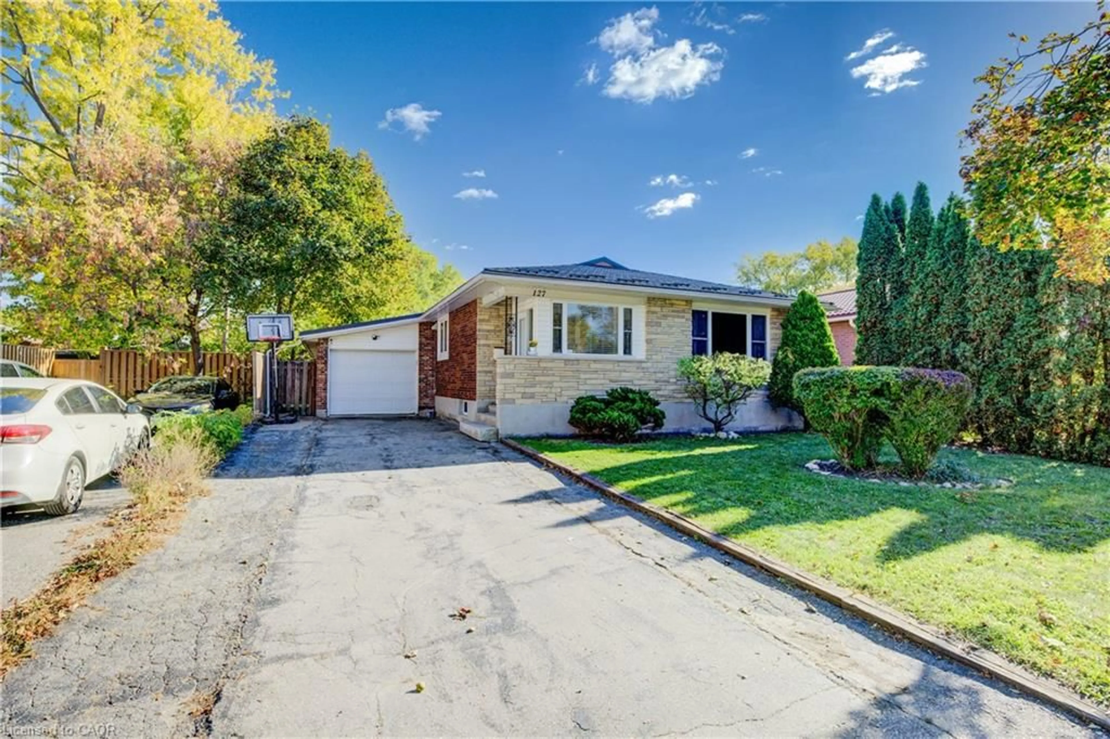 Home with brick exterior material, street for 127 Jansen Ave, Kitchener Ontario N2A 2L8