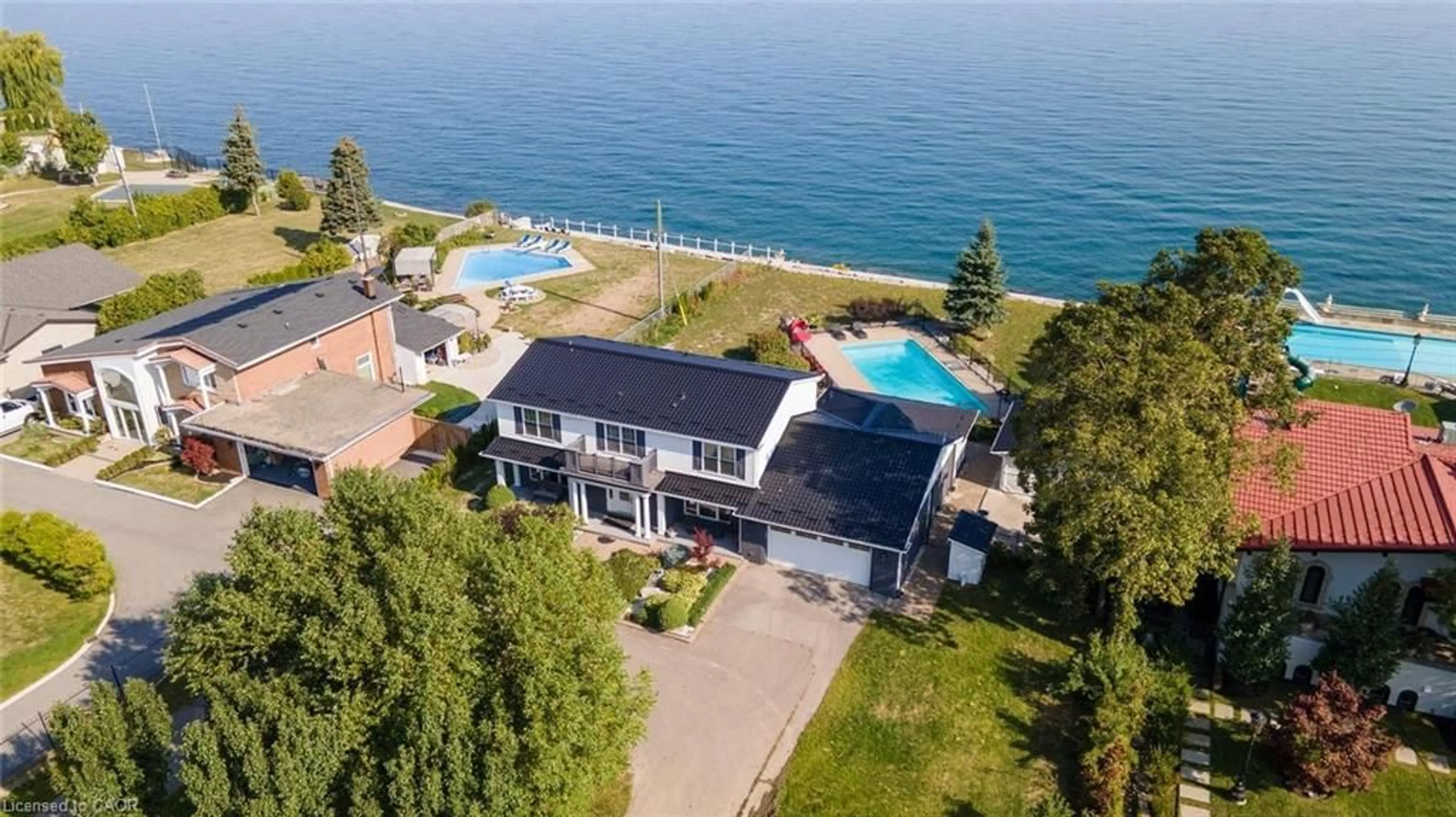 A pic from outside/outdoor area/front of a property/back of a property/a pic from drone, water/lake/river/ocean view for 1073 N Service Rd, Hamilton Ontario L8E 5E1