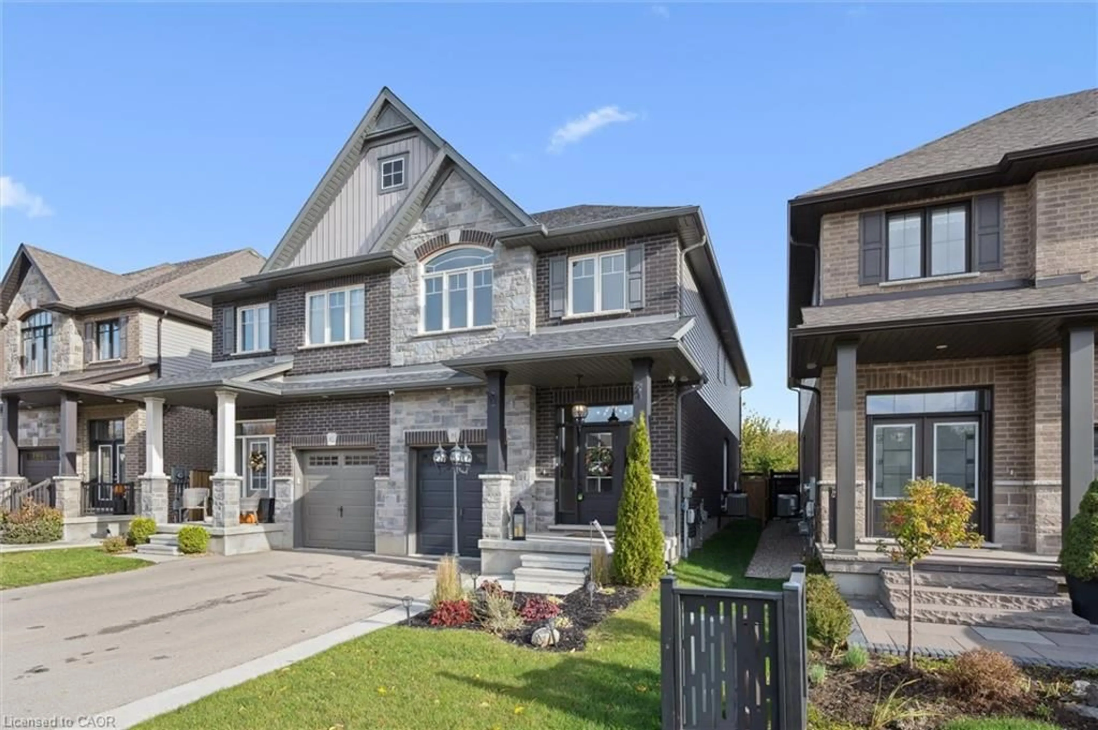 Home with brick exterior material, street for 84 Cutting Dr, Elora Ontario N0B 1S0