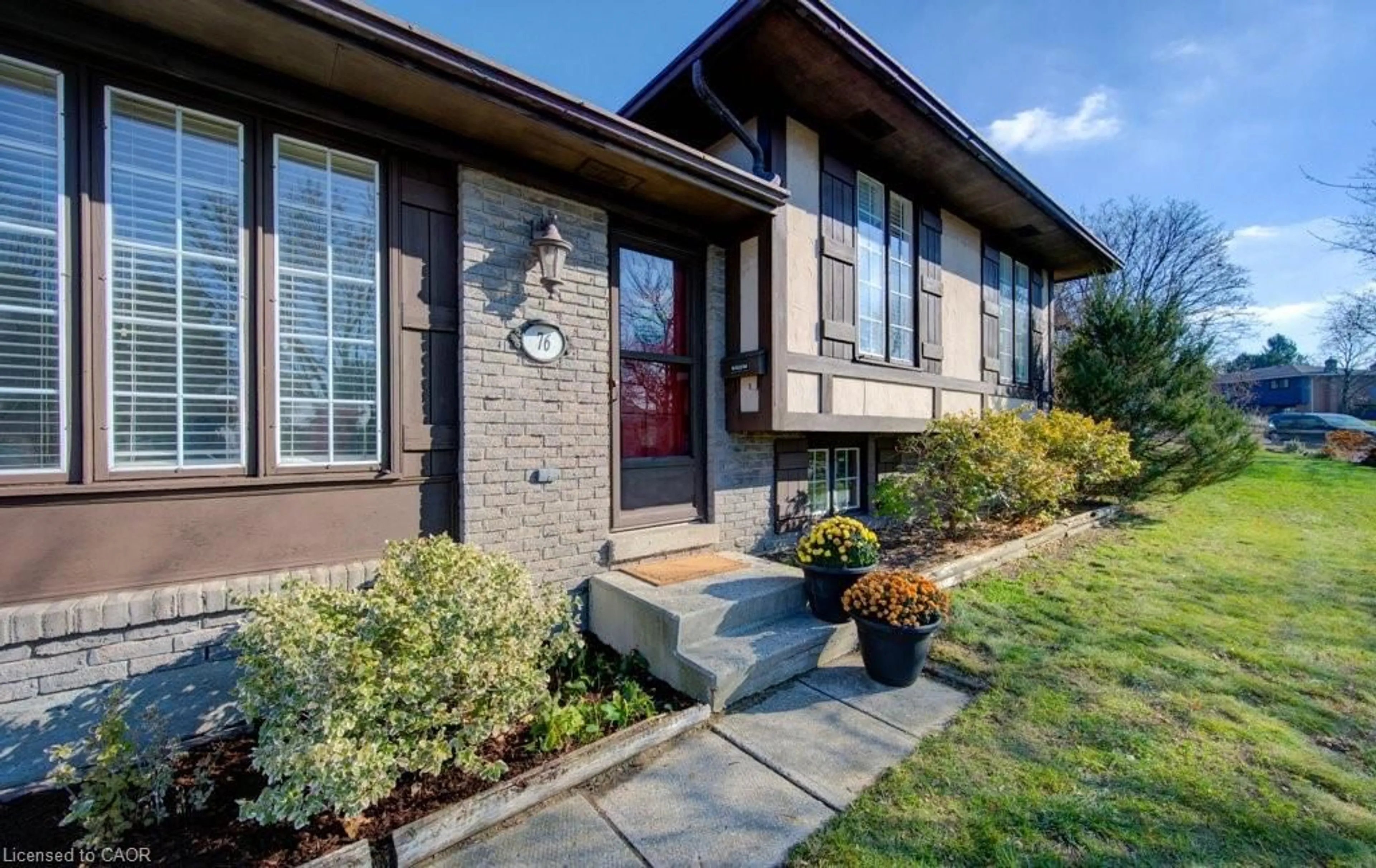 Home with brick exterior material, street for 76 Devonglen Dr, Kitchener Ontario N2E 2C5