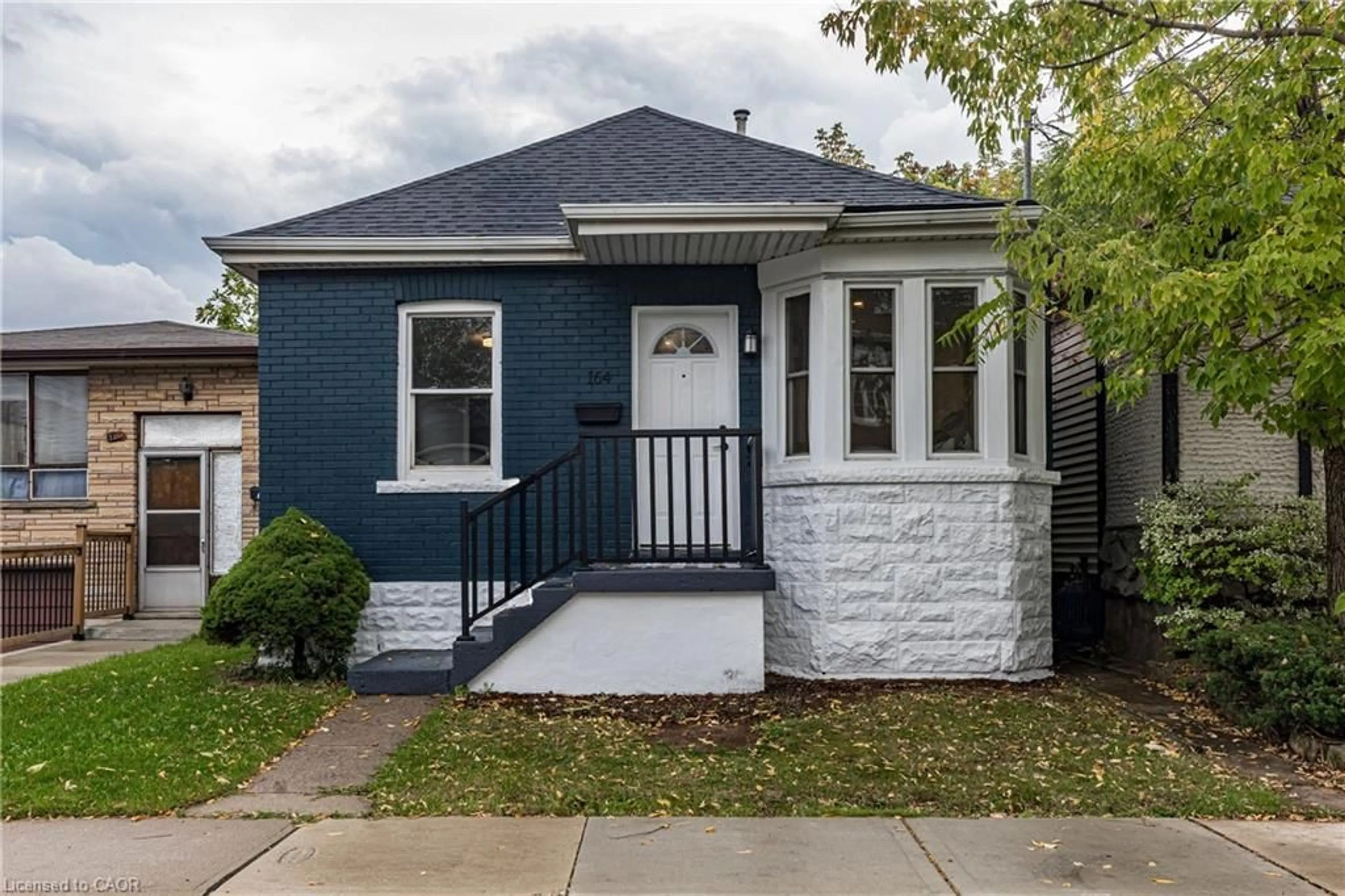Home with brick exterior material, street for 164 London St, Hamilton Ontario L8H 4B8