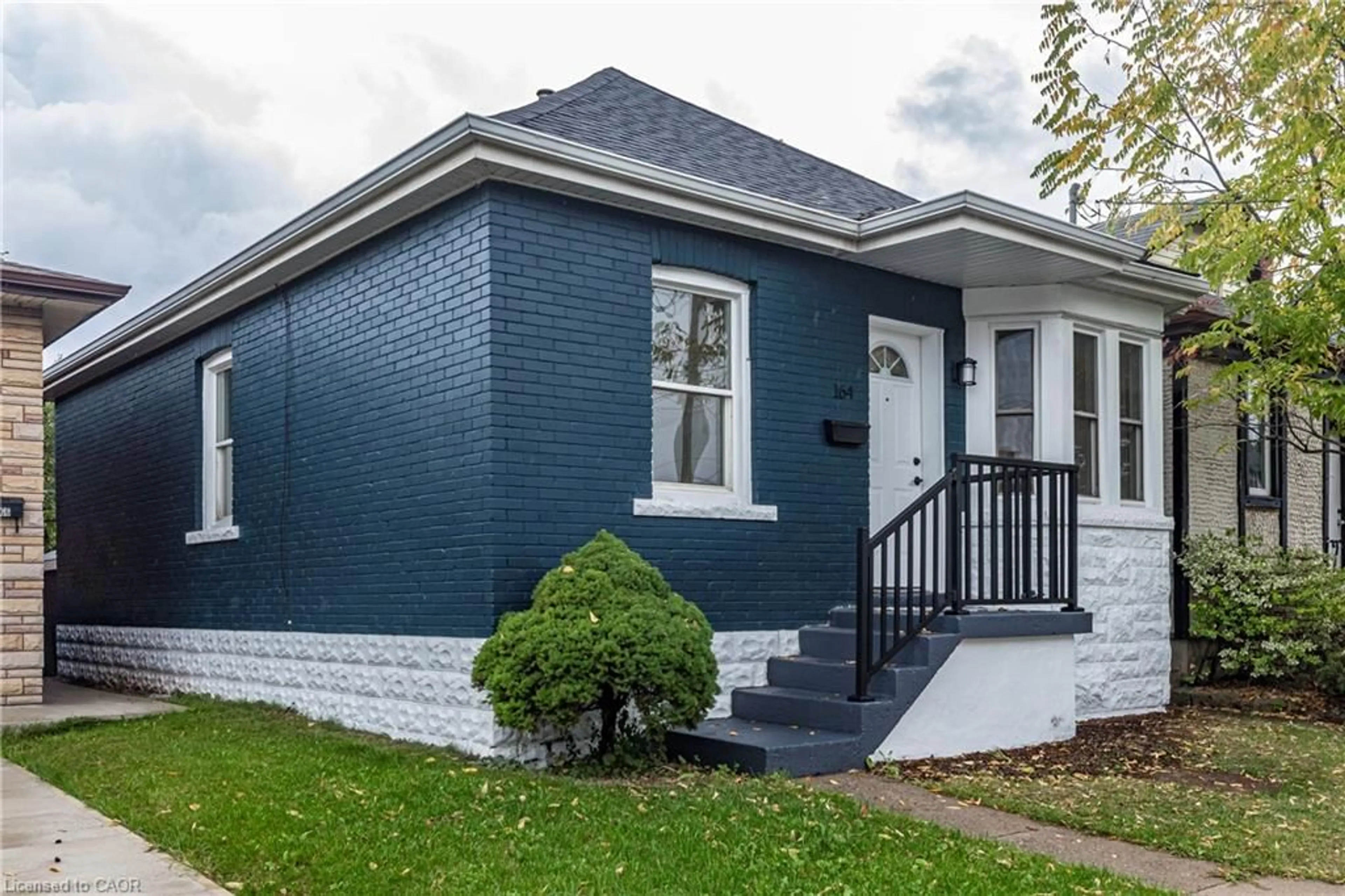 Home with brick exterior material, street for 164 London St, Hamilton Ontario L8H 4B8