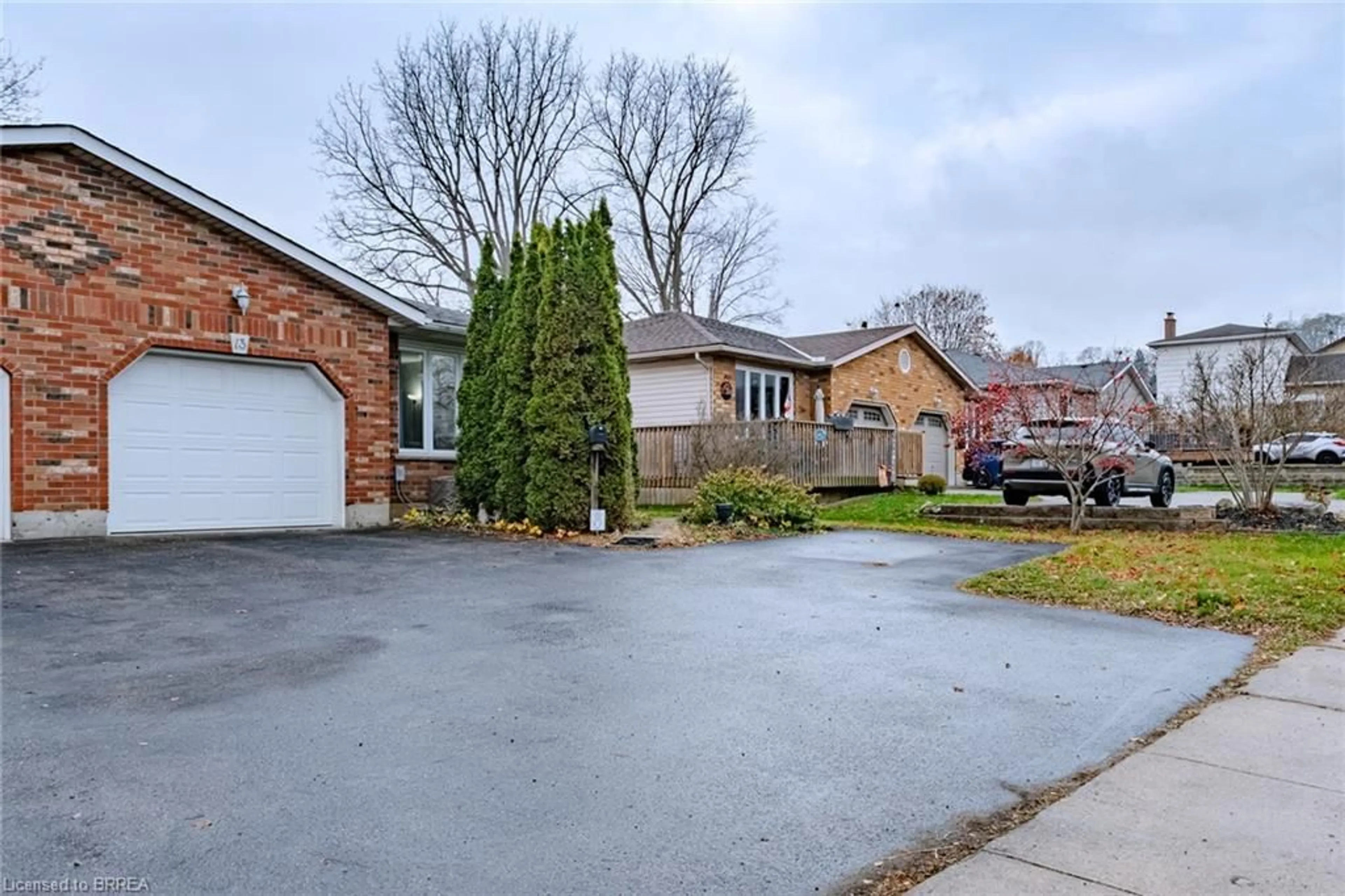 Home with brick exterior material, street for 13 Dundas St, Paris Ontario N3L 1E9