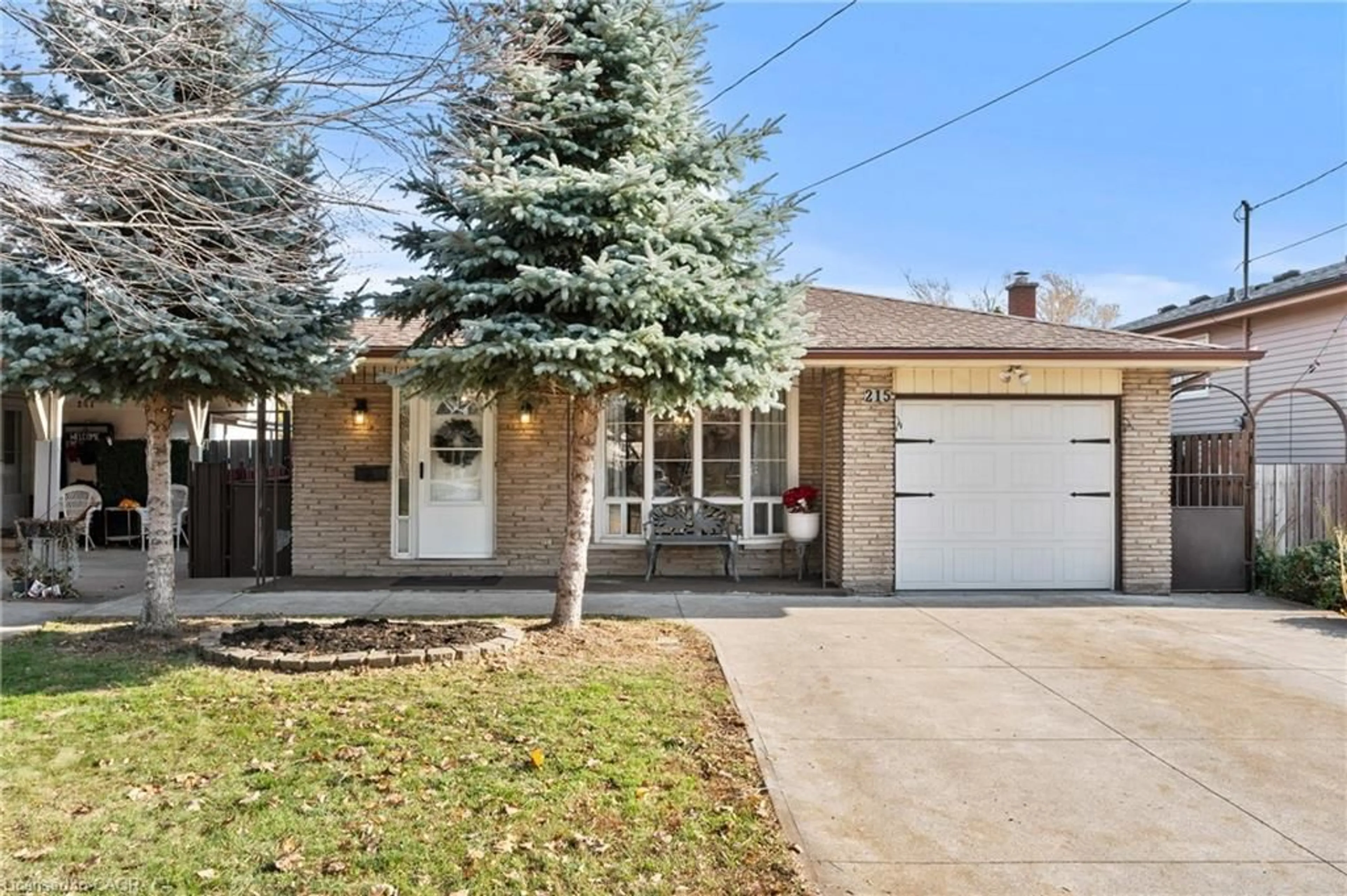 Home with brick exterior material, street for 215 Berkindale Dr, Hamilton Ontario L8E 2R6