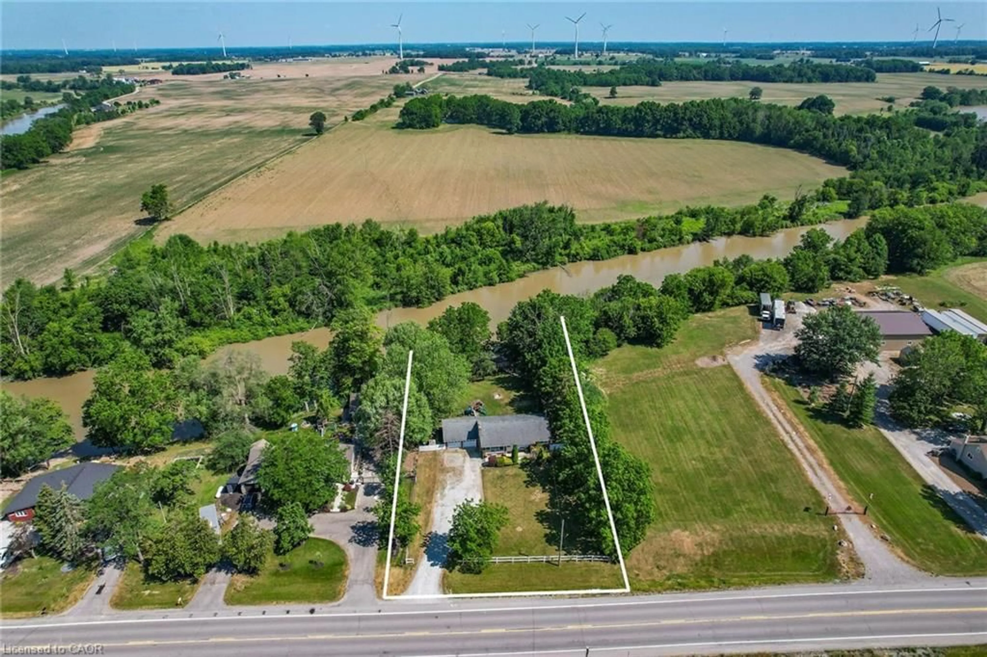 A pic from outside/outdoor area/front of a property/back of a property/a pic from drone, street for 73222 #27 Regional Rd, Wellandport Ontario L0R 2J0