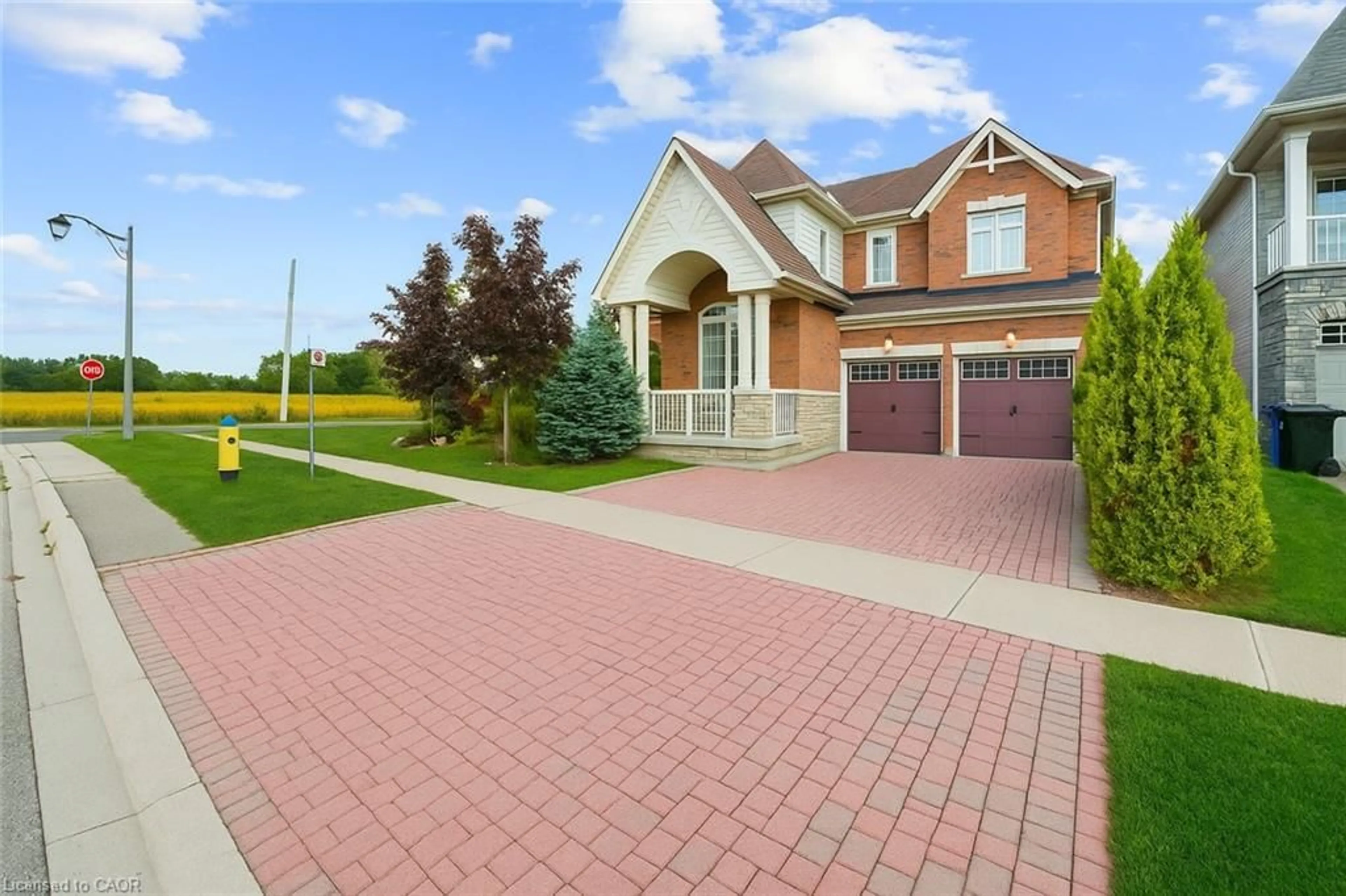 Home with brick exterior material, street for 2 Kennedy Blvd, Alliston Ontario L9R 0L4