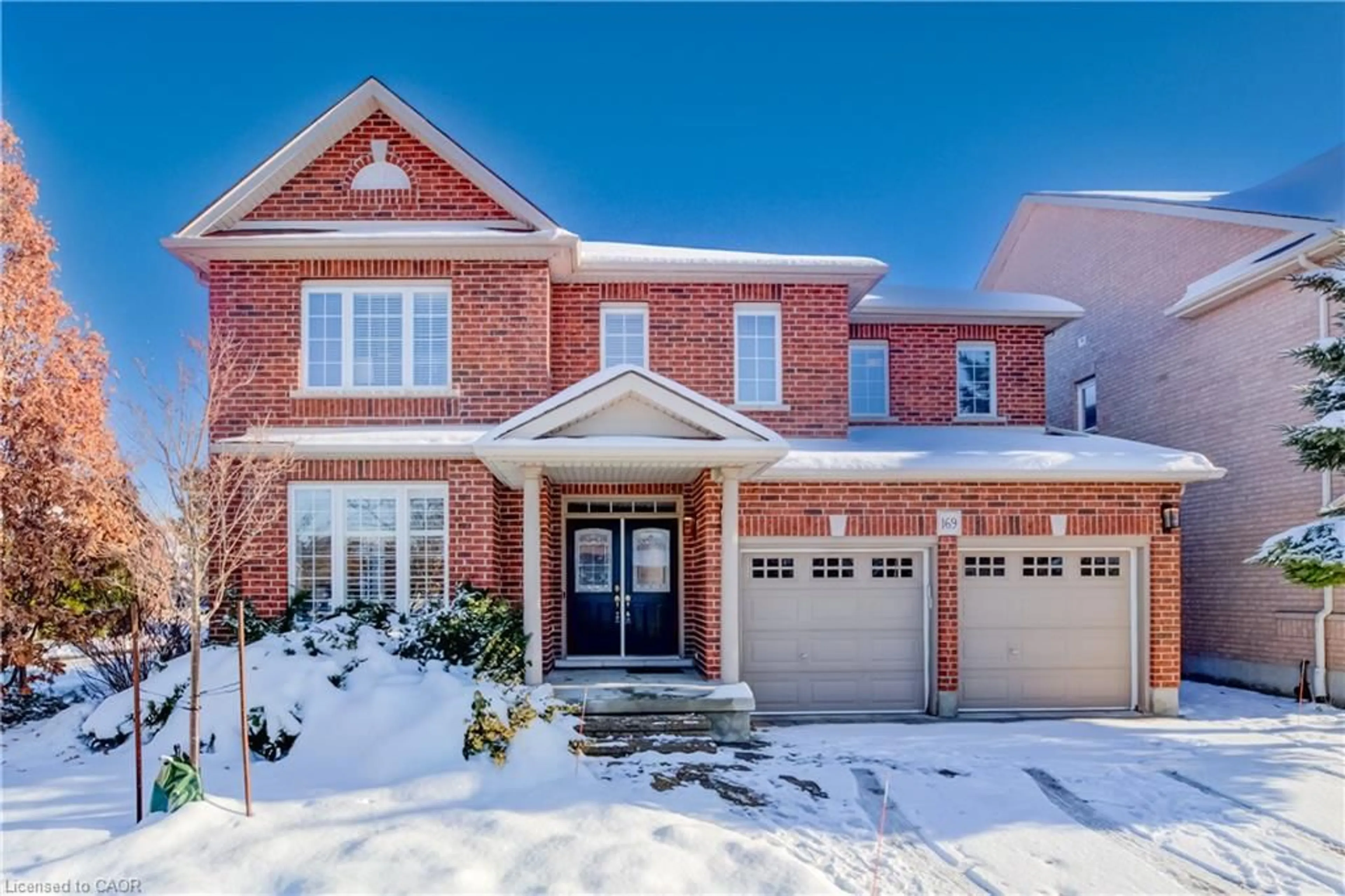 Home with brick exterior material, street for 169 Falconridge Dr, Kitchener Ontario N2K 4J9