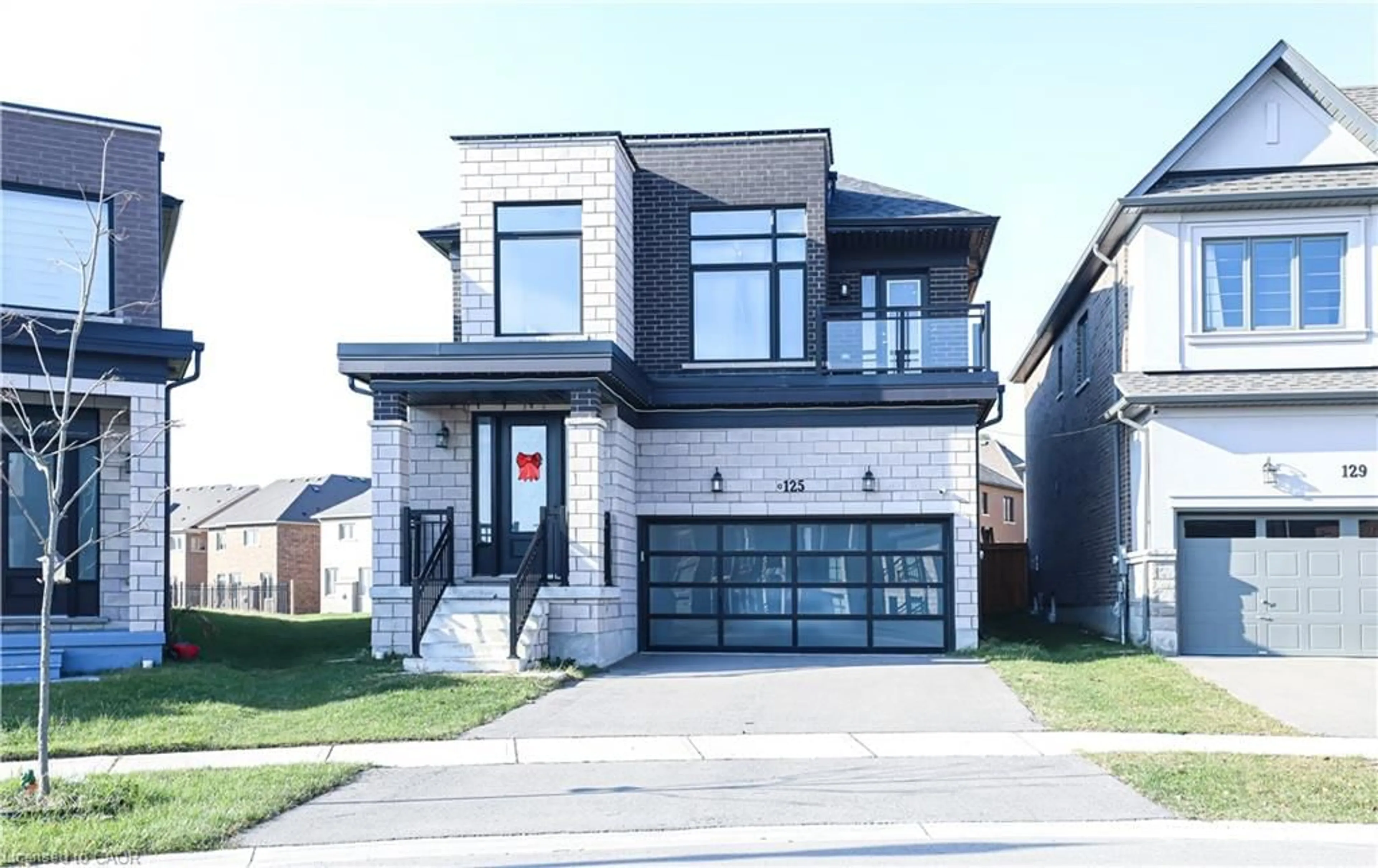 Home with brick exterior material, street for 125 Silverwood Cres, Woodstock Ontario N4T 0M5
