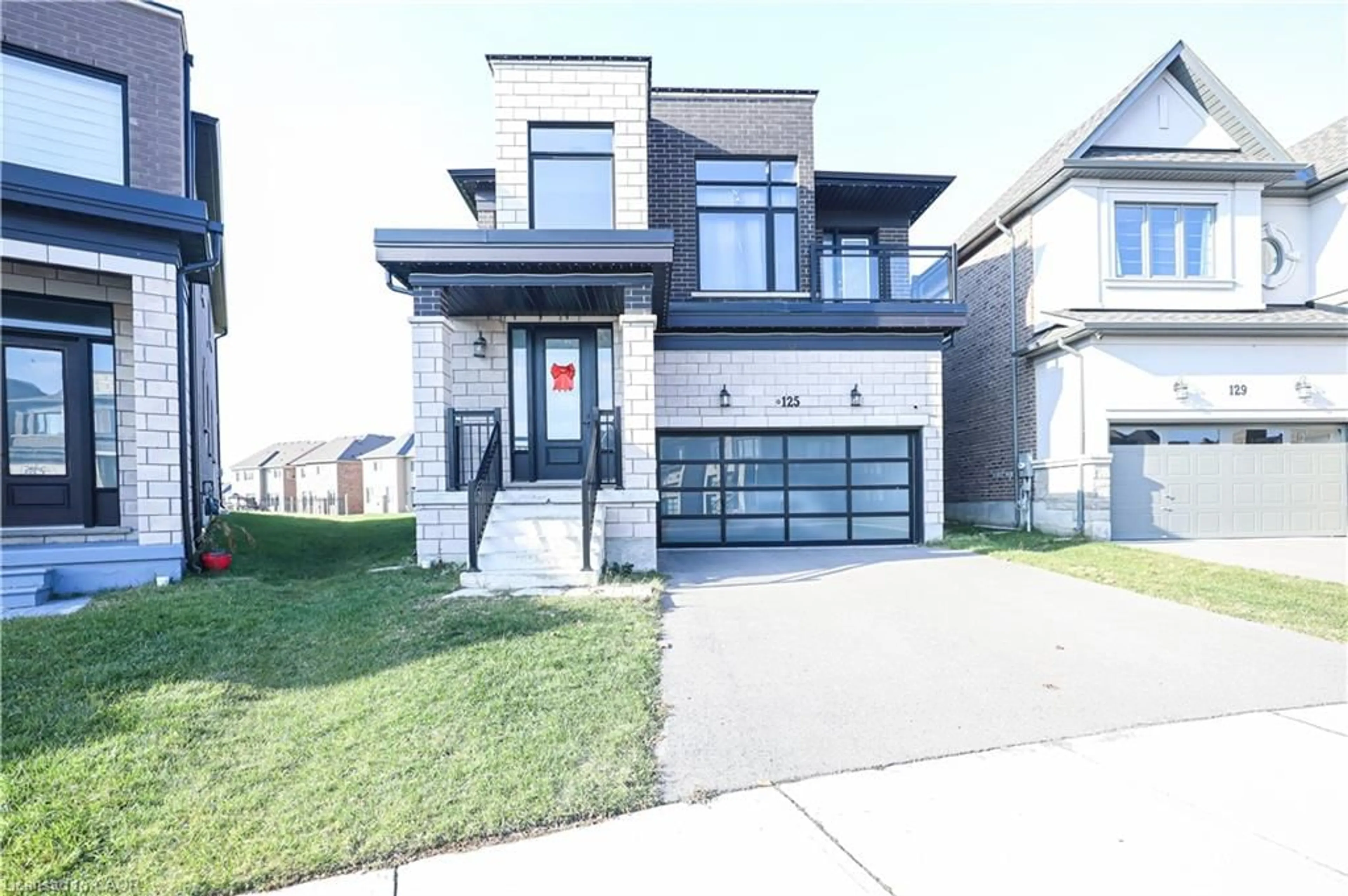 Home with brick exterior material, street for 125 Silverwood Cres, Woodstock Ontario N4T 0M5