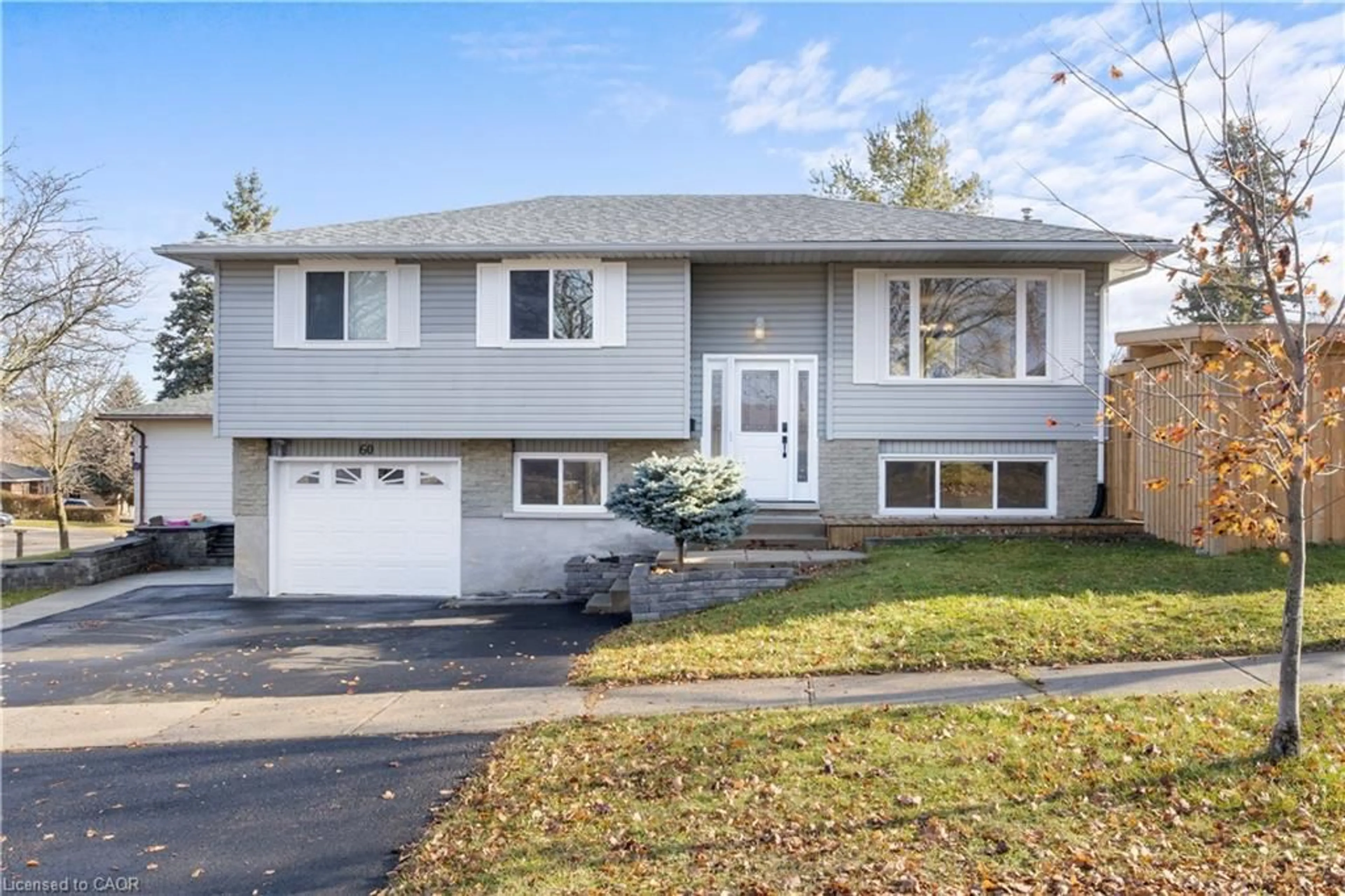 Home with vinyl exterior material, street for 60 Devonglen Dr, Kitchener Ontario N2E 2C5