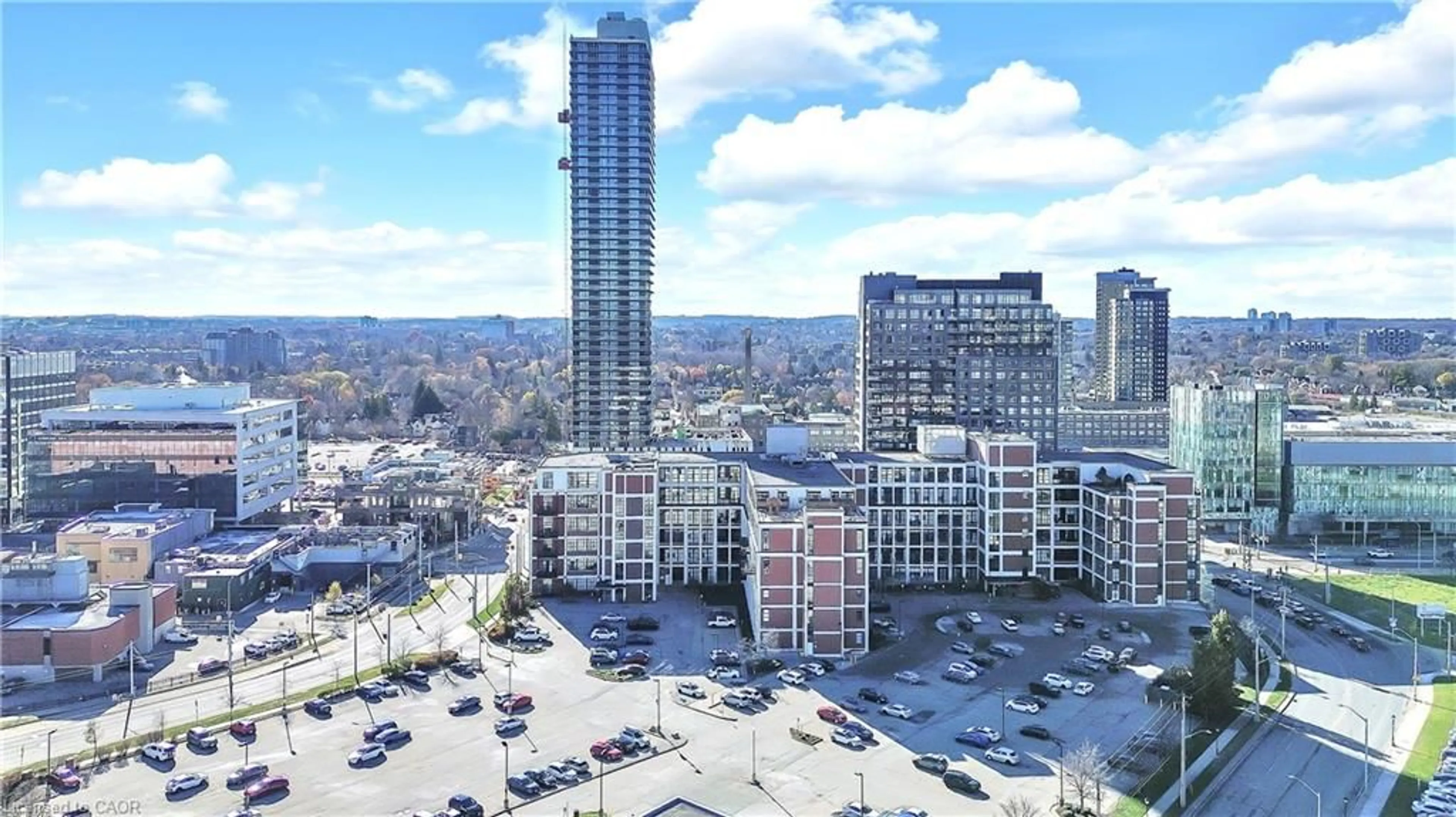 A pic from outside/outdoor area/front of a property/back of a property/a pic from drone, city buildings view from balcony for 404 King St #109, Kitchener Ontario N2G 4Z9