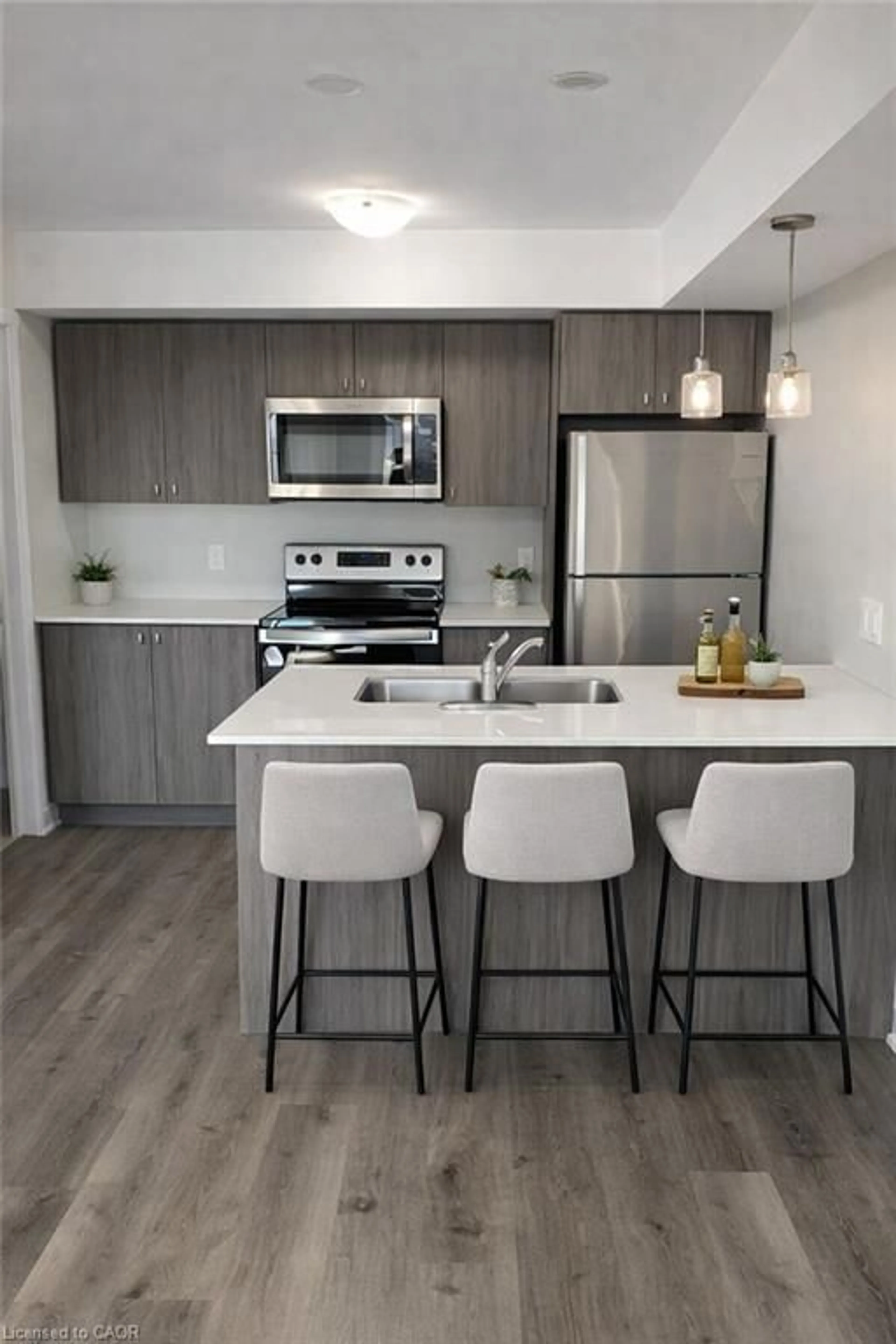 Open concept kitchen, unknown for 1331 Countrystone Dr #B5, Kitchener Ontario N2N 3R9