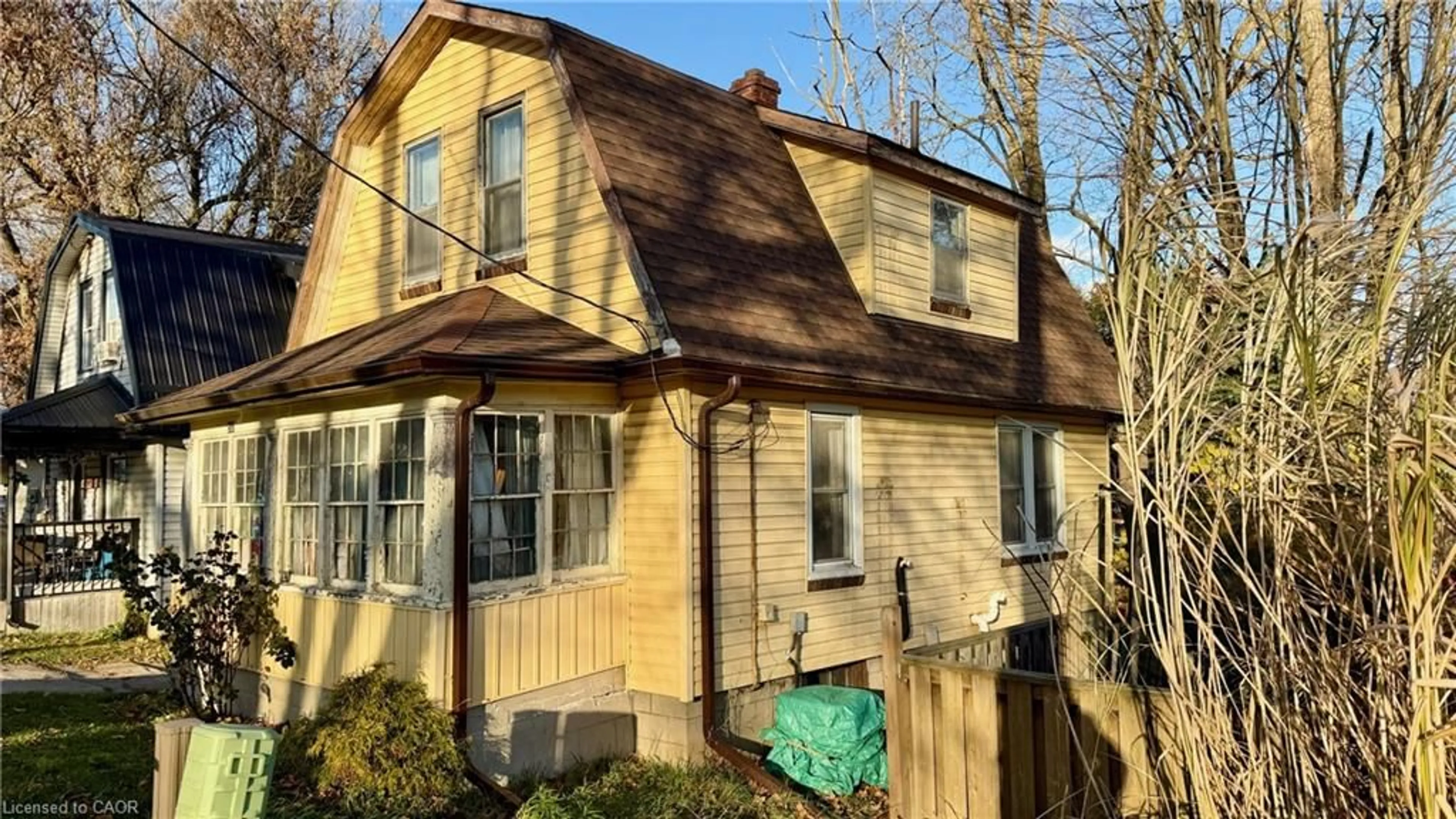 Home with vinyl exterior material, street for 217 Queen St, Simcoe Ontario N3Y 3Y8