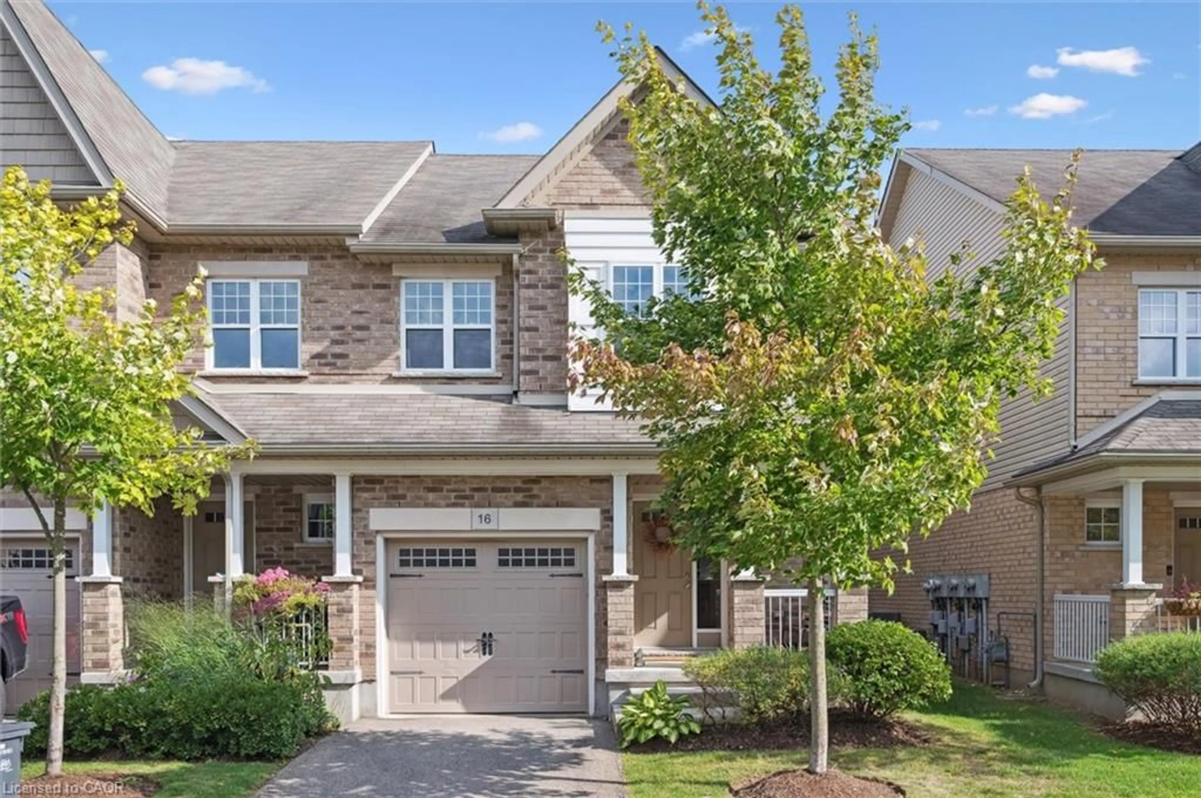 Home with brick exterior material, street for 167 Arkell Rd #16, Guelph Ontario N1L 0J9