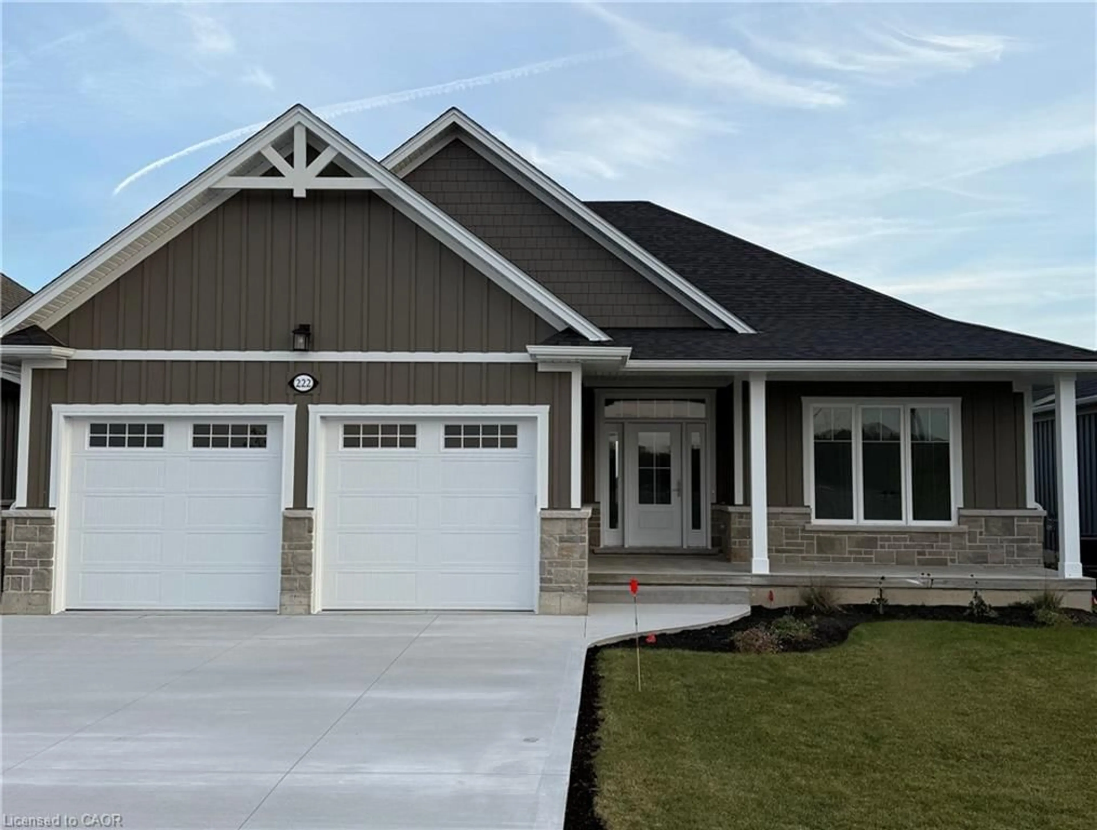 Home with vinyl exterior material, street for 222 Schooner Dr, Port Dover Ontario N0A 1N3