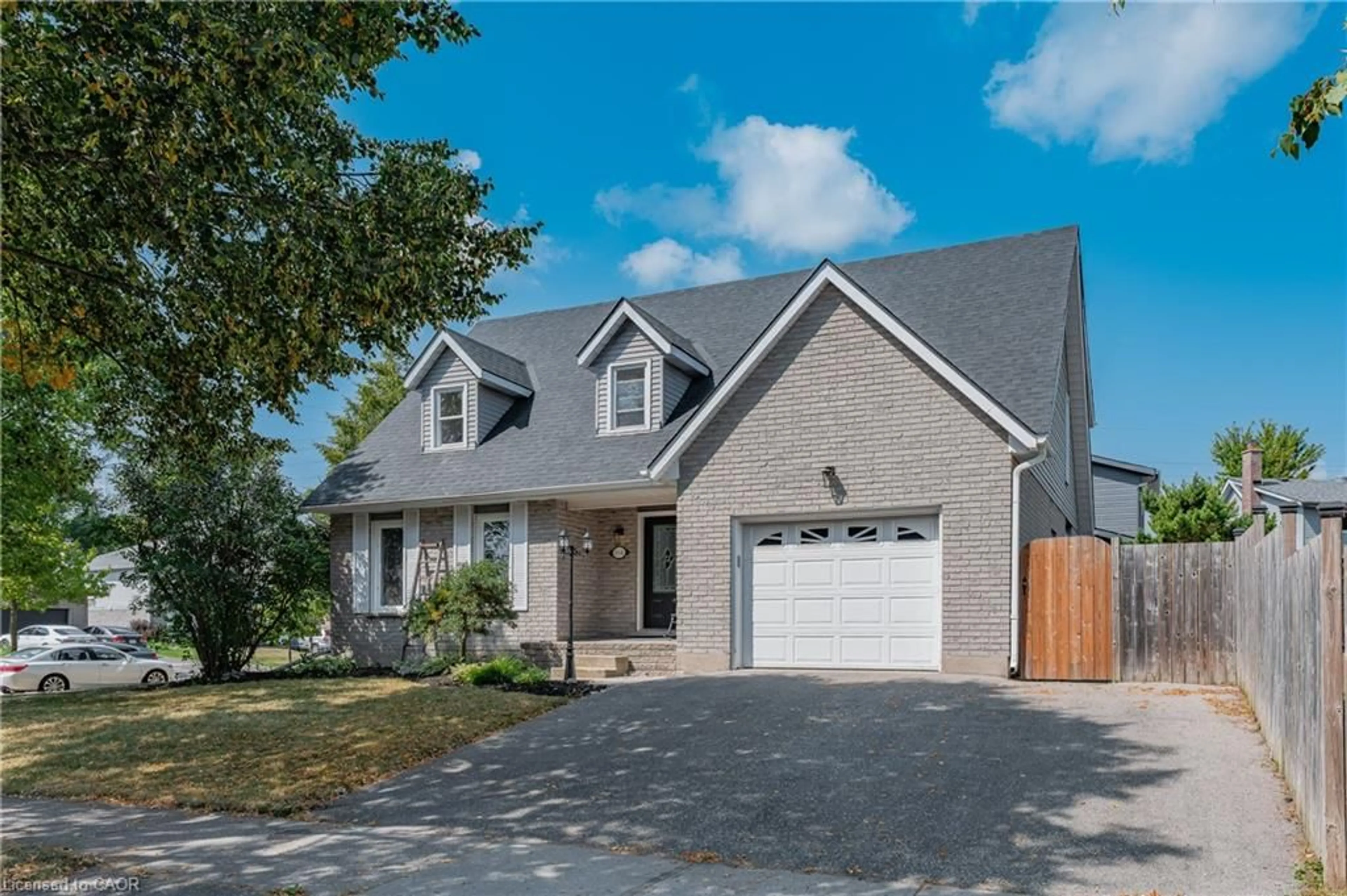 Home with brick exterior material, street for 154 Covington Cres, Kitchener Ontario N2N 2X4