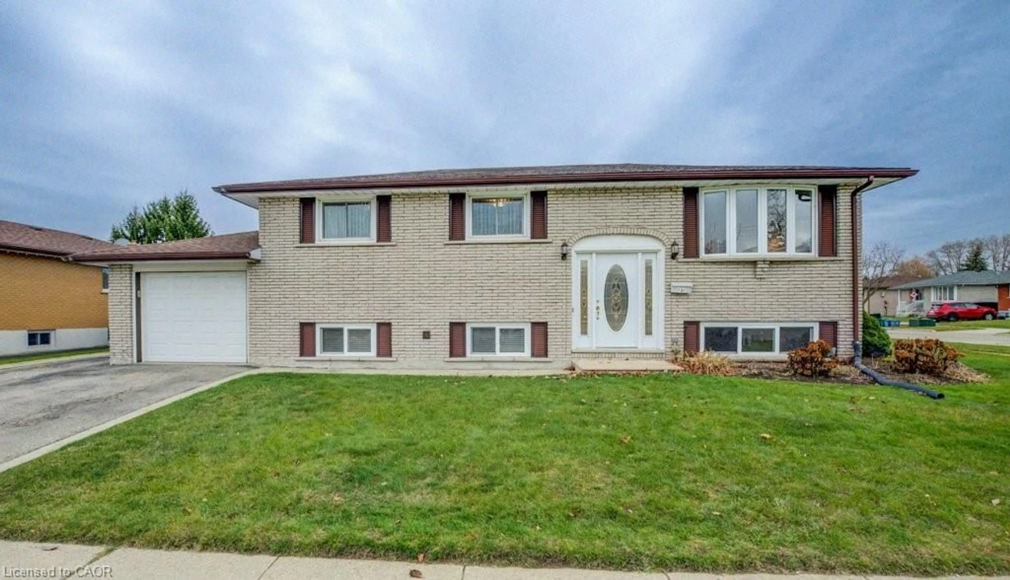 Home with brick exterior material, street for 131 Thunderbird Dr, Cambridge Ontario N1R 6H2
