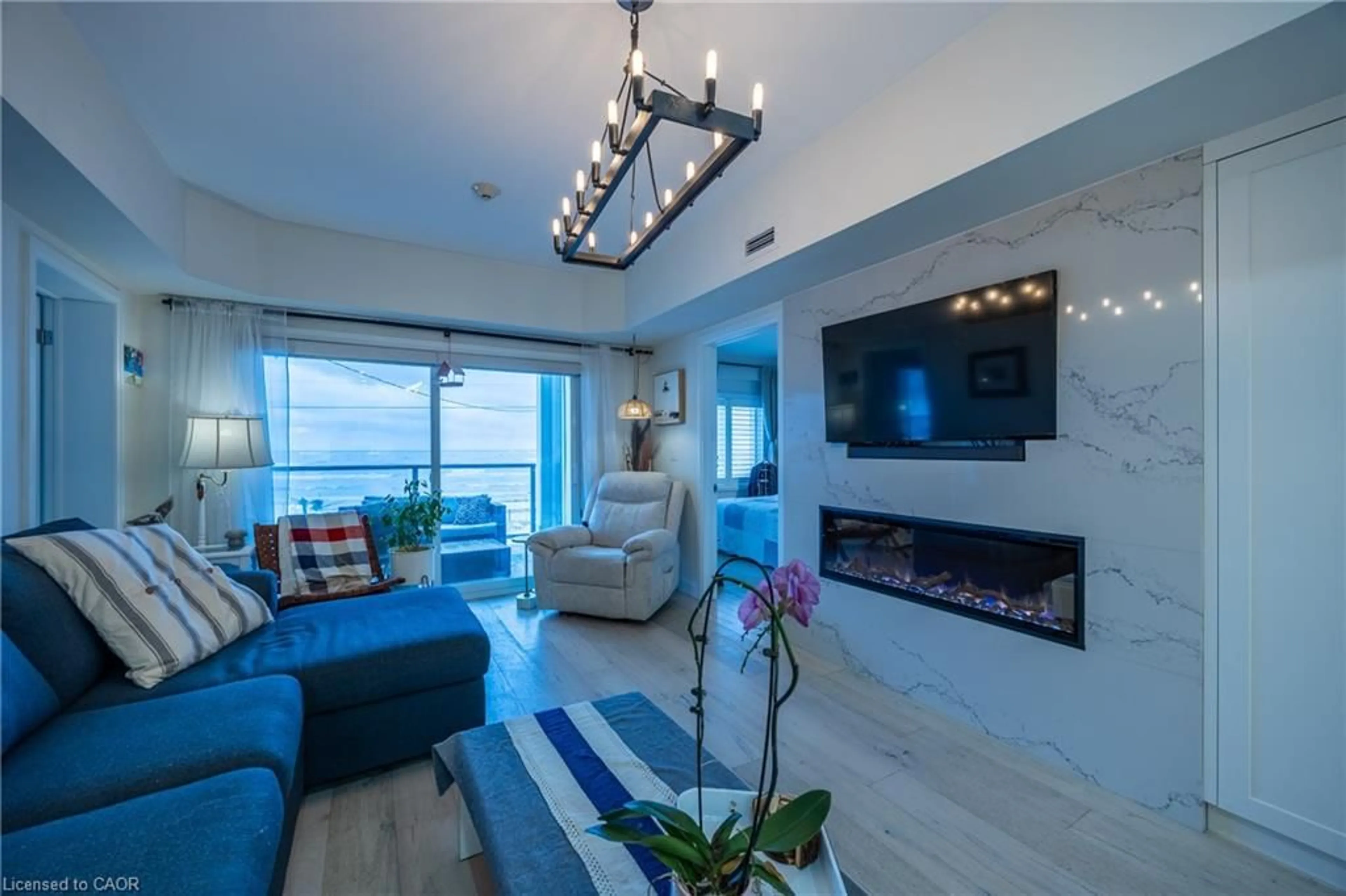 Living room with furniture, unknown for 12 Erie Blvd #209, Long Point Ontario N0E 1M0