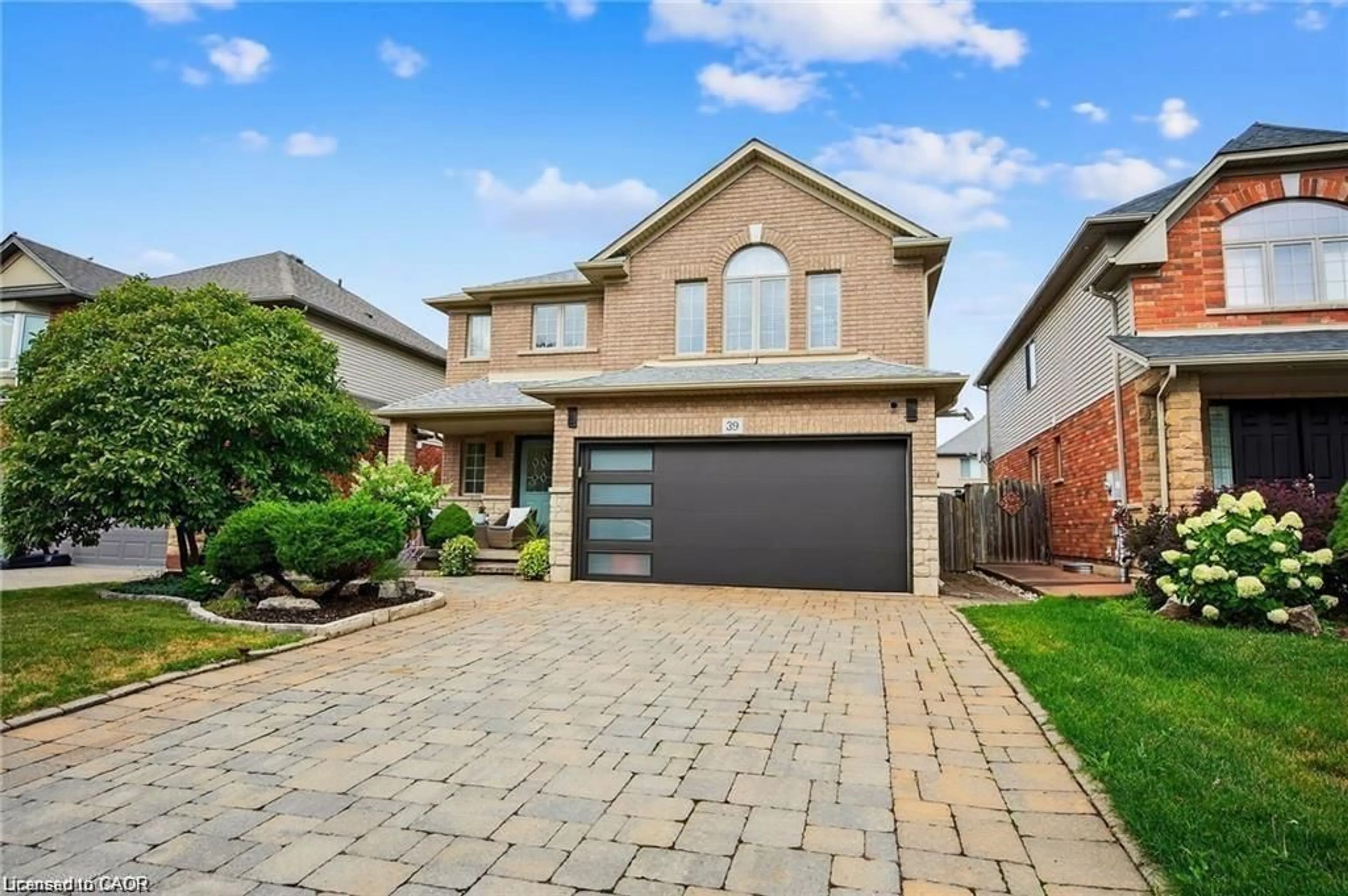 Home with brick exterior material, street for 39 Wilbur Dr, Binbrook Ontario L0R 1C0